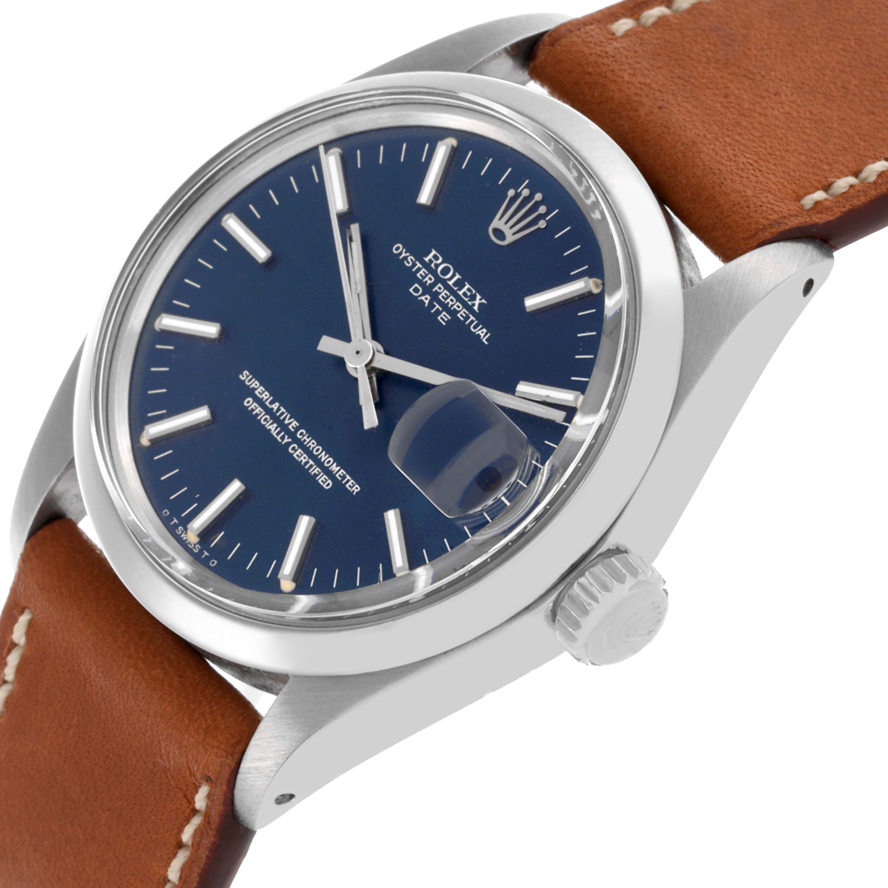 The Rolex Date 1500 Men's Stainless Steel Blue Dial 1500 Men's Stainless Steel Blue Dial watch is shown at an angled view, displaying the dial, case, crown, and part of the leather strap.