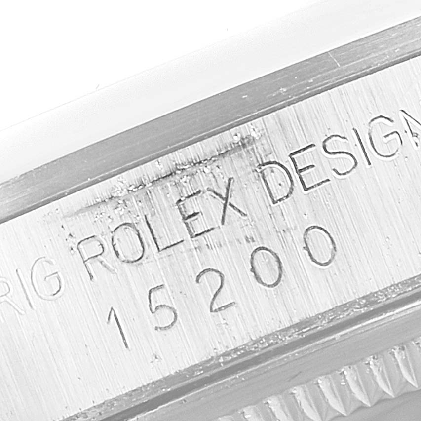 This is a close-up angle showing the serial number and "Rolex Design" engraving on a Rolex Date 15200 Men's Stainless Steel Silver Dial 15200 Men's Stainless Steel Silver Dial model 15200.