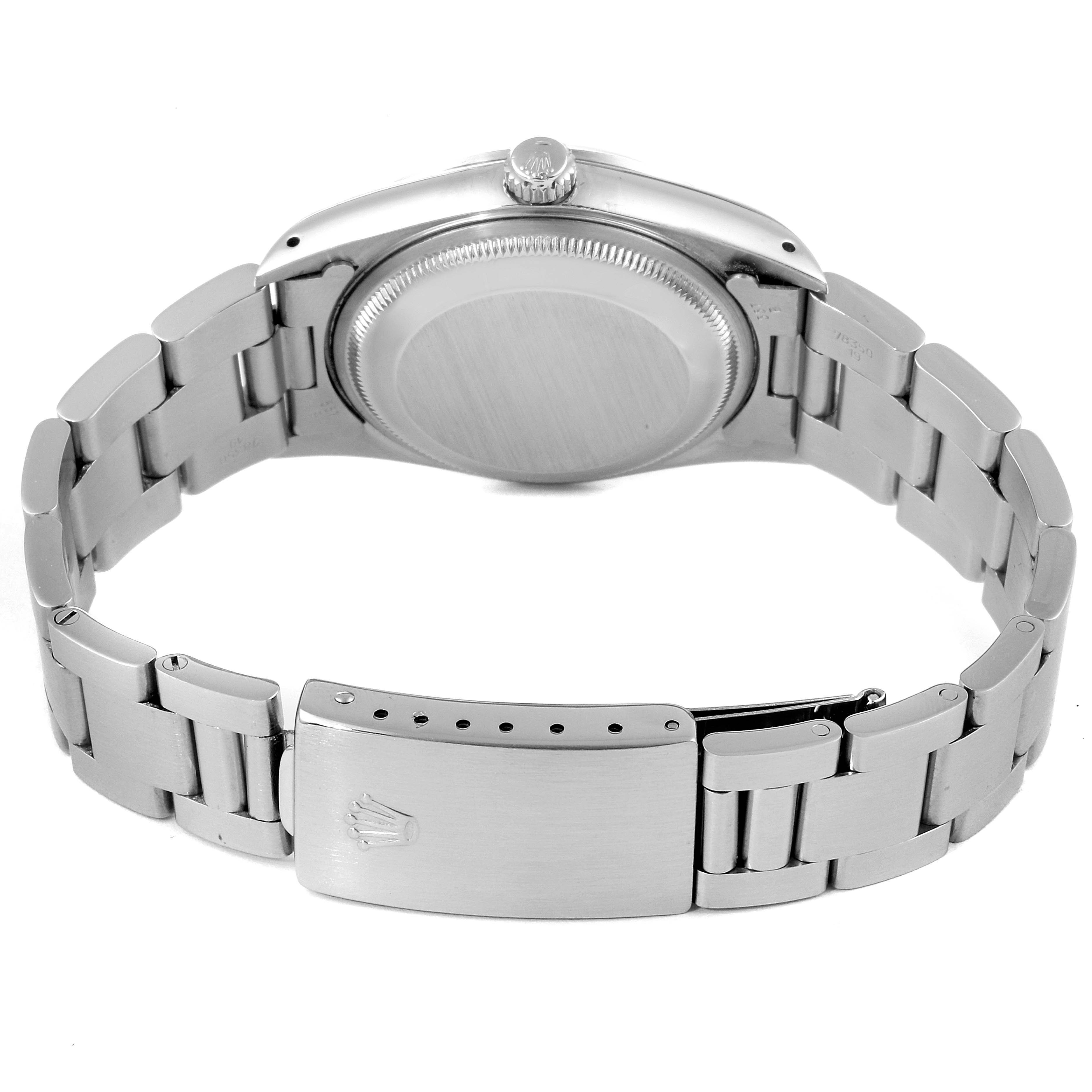 This image shows the back view of a Rolex Date 15200 Men's Stainless Steel Silver Dial 15200 Men's Stainless Steel Silver Dial model watch, highlighting the case back, crown, and bracelet with clasp.