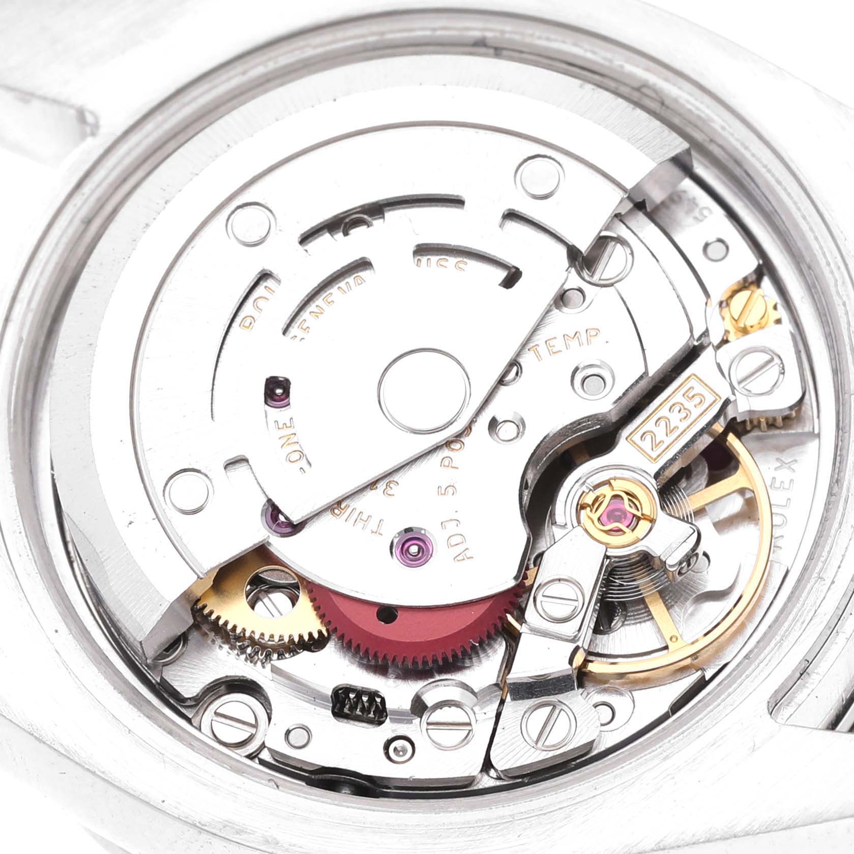The image shows a close-up of the Rolex Datejust 179384 Women's Stainless Steel Silver Dial 179384 Women's Stainless Steel Silver Dial watch's movement from the back, highlighting its intricate inner mechanics and components.