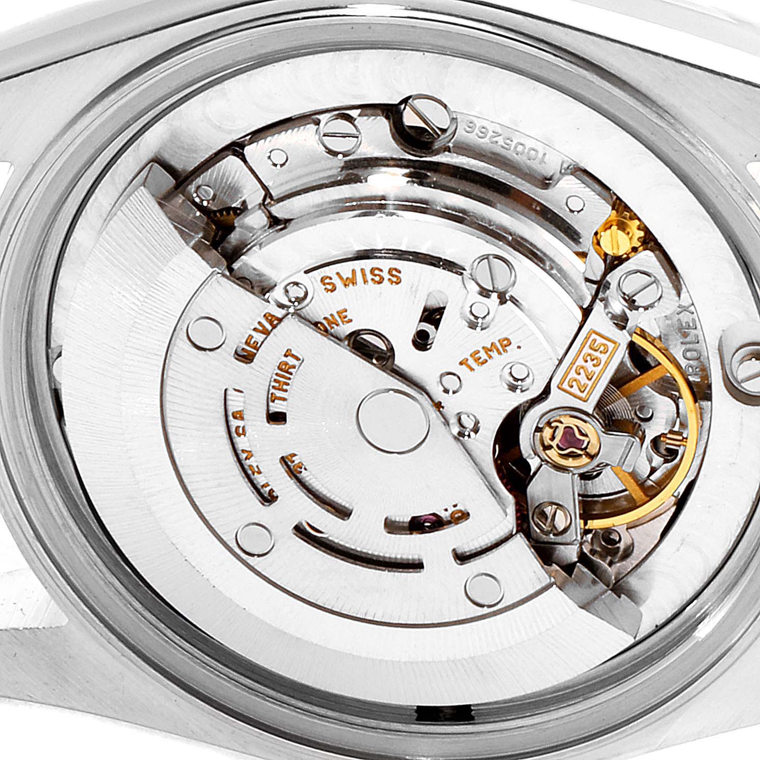The image shows a close-up view of the internal movement parts of a mid-size Rolex watch.