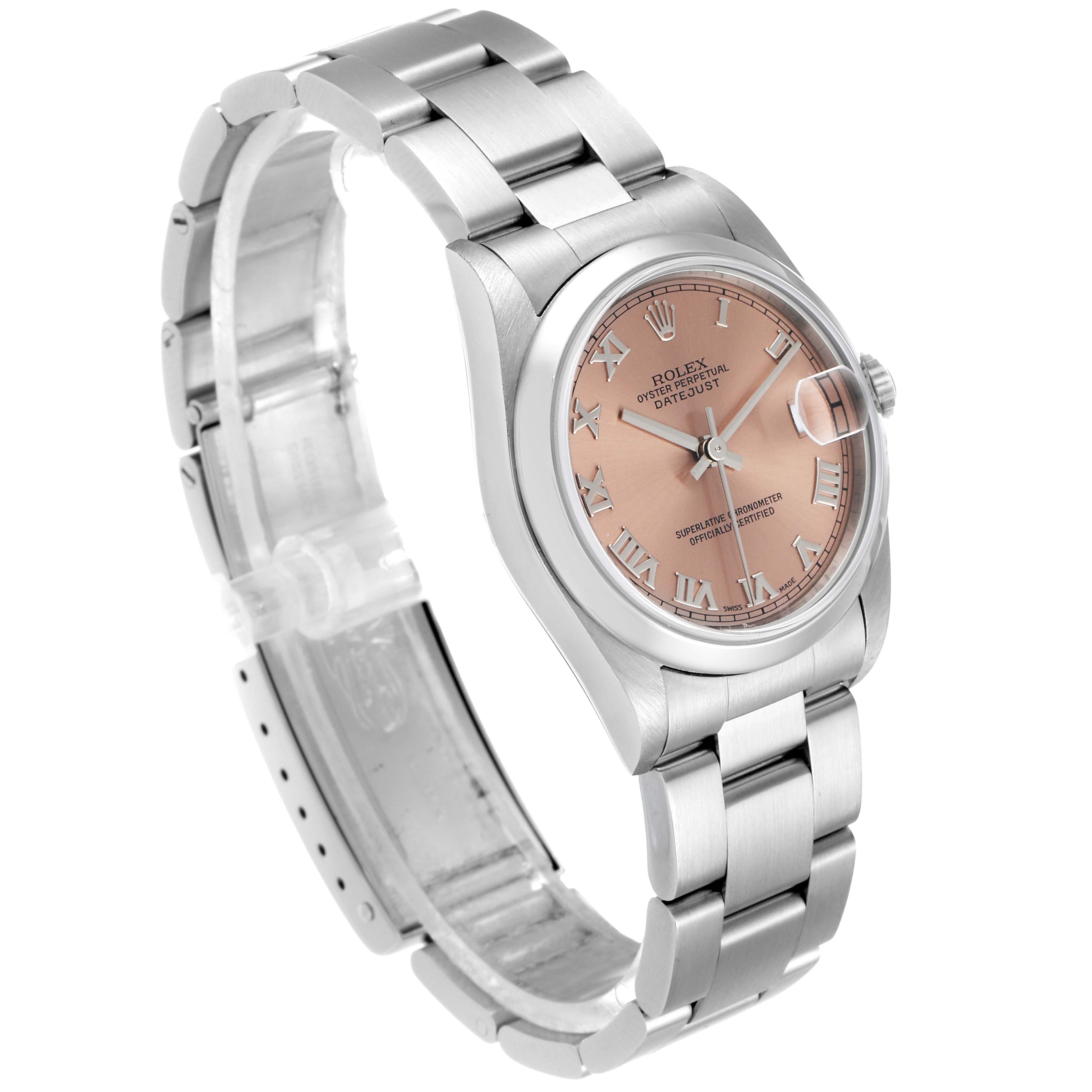 This Rolex Mid-Size 78240 Women's Stainless Steel Pink Dial 78240 Women's Stainless Steel Pink Dial Datejust watch is viewed at a three-quarter angle, showing its pink dial, Roman numerals, and stainless steel bracelet.