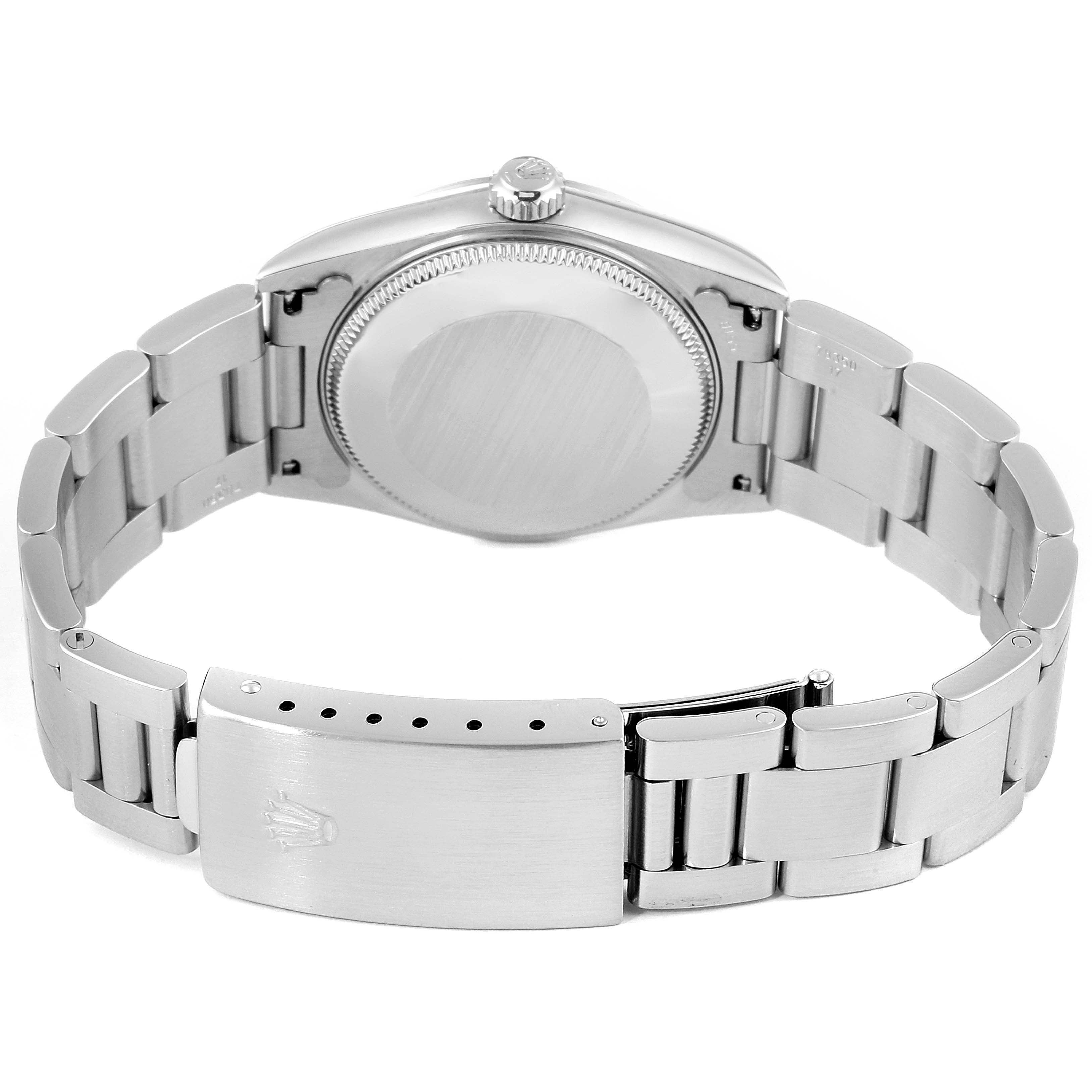 This image shows the back and clasp of a Rolex Mid-Size 78240 Women's Stainless Steel Pink Dial 78240 Women's Stainless Steel Pink Dial model watch with a stainless steel bracelet.