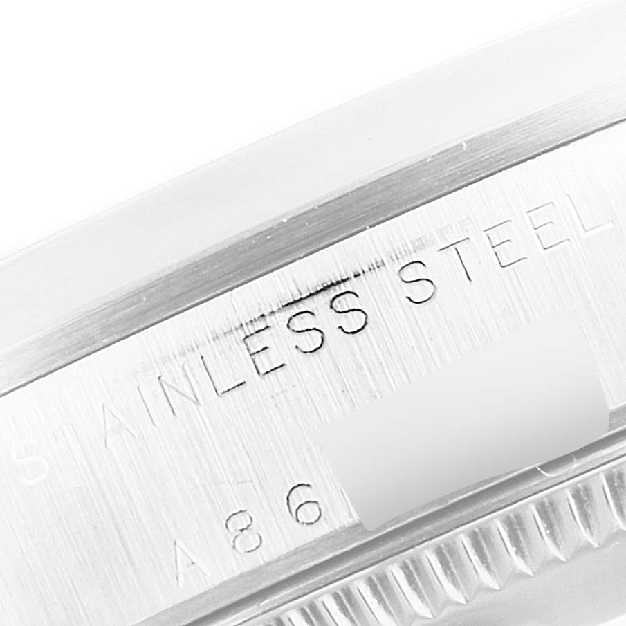 This image shows a close-up of the stainless steel case back of a Rolex Mid-Size 78240 Women
s Stainless Steel Silver Dial 78240 Women
s Stainless Steel Silver Dial model watch.