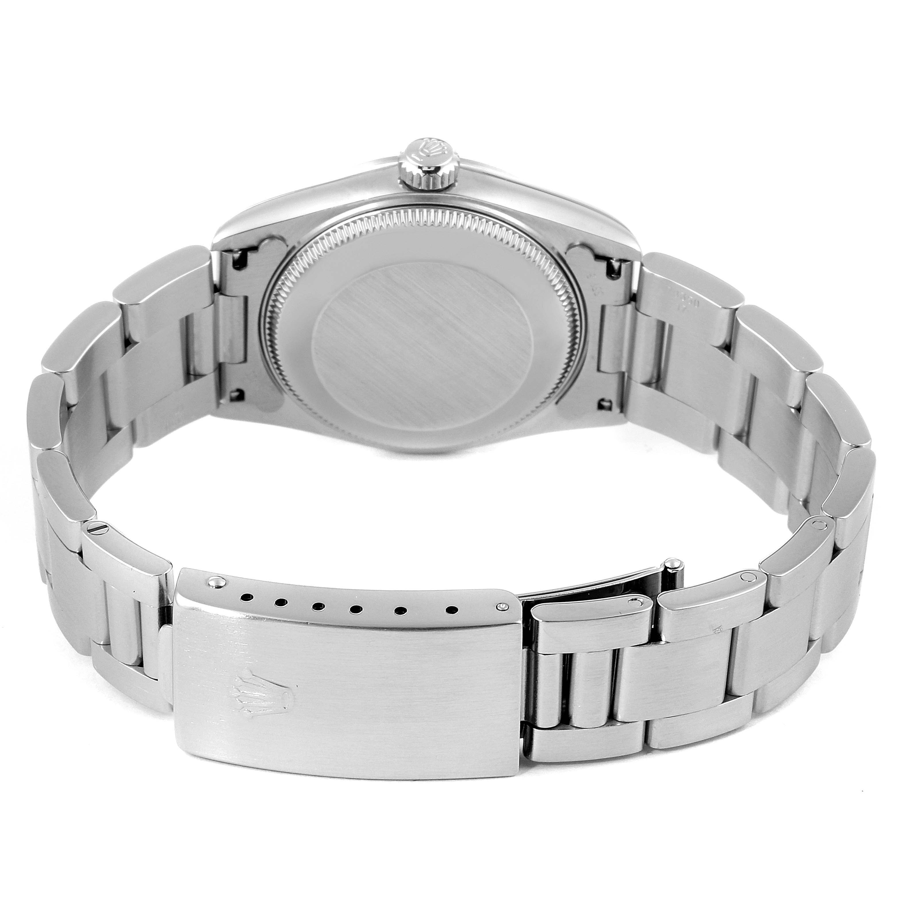 The image shows the back side of a Rolex Mid-Size 78240 Women
s Stainless Steel Silver Dial 78240 Women
s Stainless Steel Silver Dial watch, highlighting the case back and clasp.