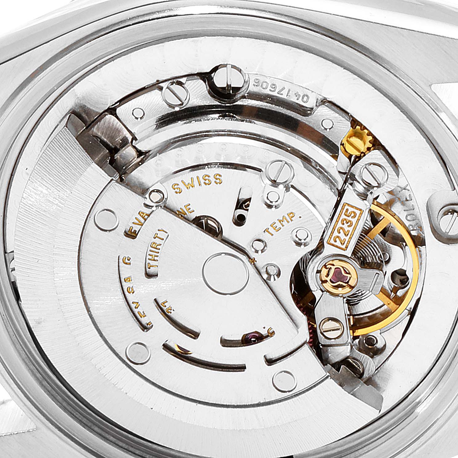 This image shows a close-up of the movement mechanism inside a Rolex Mid-Size 78240 Women
s Stainless Steel Silver Dial 78240 Women
s Stainless Steel Silver Dial model watch.