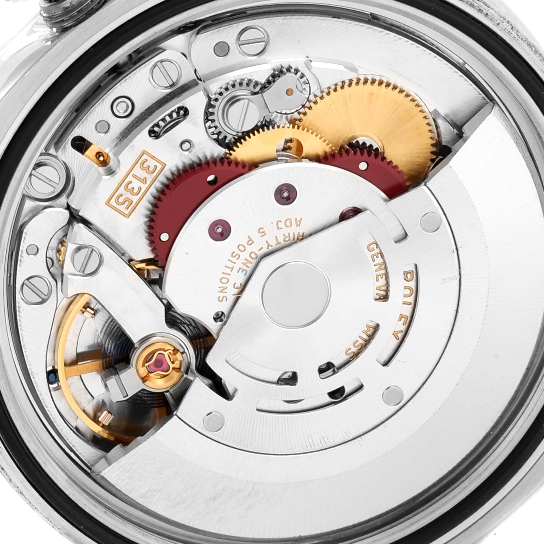 This image shows the internal mechanism of a Rolex Datejust 116243 Men's Steel and Gold (two tone) Silver Dial 116243 Men's Steel and Gold (two tone) Silver Dial watch from a close-up angle.