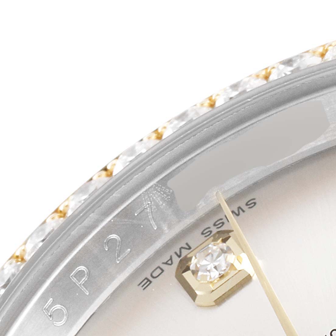 The image shows a close-up angle of the dial and bezel details of a Rolex Datejust 116243 Men's Steel and Gold (two tone) Silver Dial 116243 Men's Steel and Gold (two tone) Silver Dial watch.