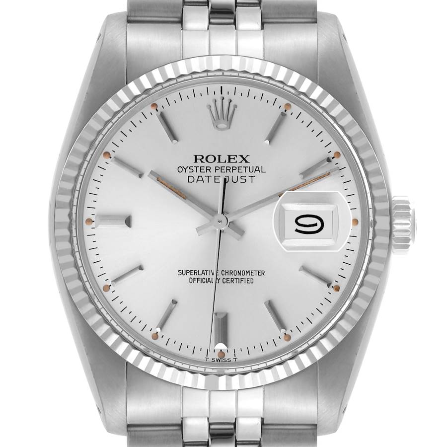 The Rolex Datejust is shown from a frontal angle, highlighting the face, bezel, and part of the bracelet.