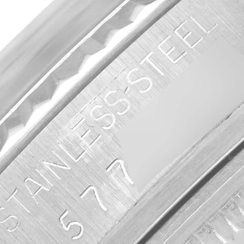 The image shows a close-up of the Rolex Datejust 16014 Men's Stainless Steel Silver Dial 16014 Men's Stainless Steel Silver Dial's side engravings, focusing on the stainless steel markings.