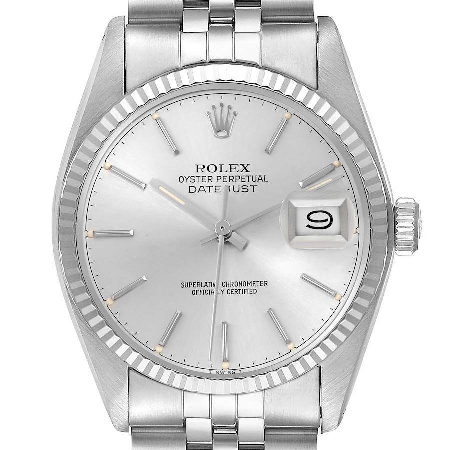 The Rolex Datejust watch is shown from a front angle, displaying the dial, bezel, crown, and part of the bracelet.