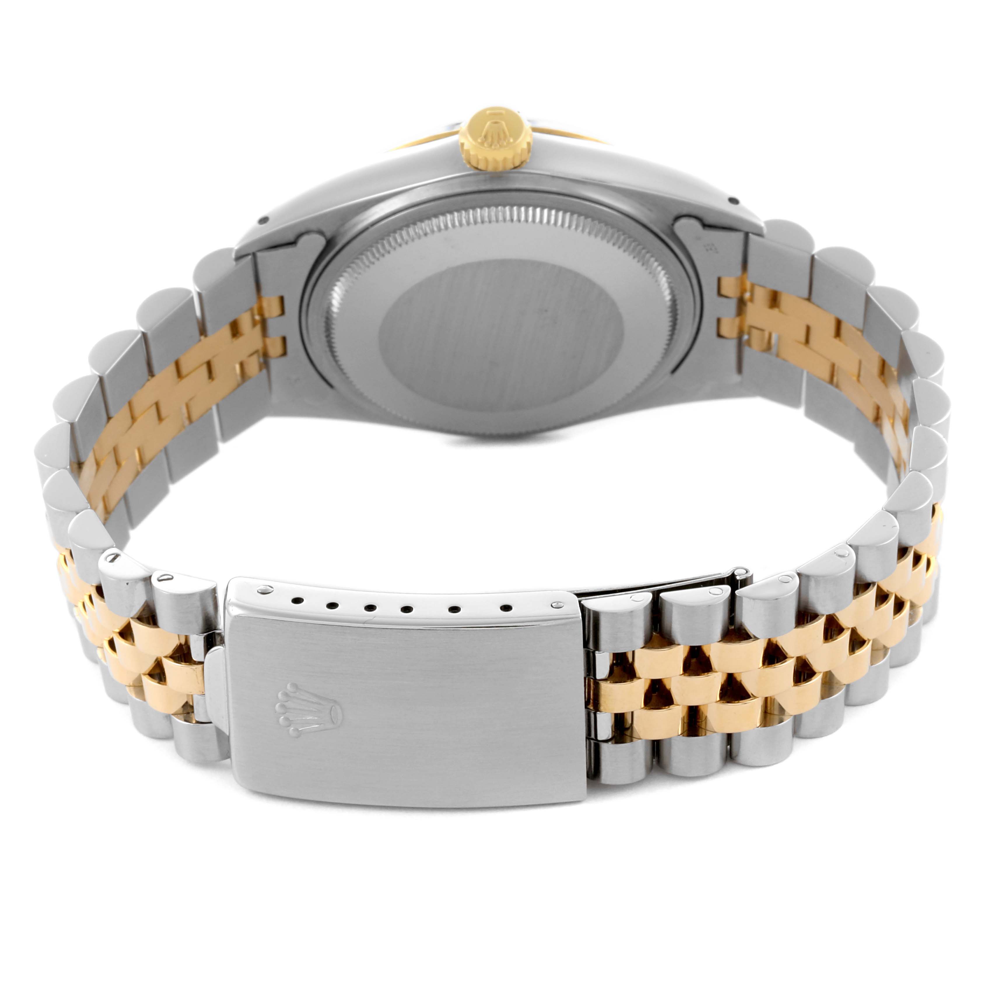 The image shows the back and clasp of a Rolex Datejust 16013 Men
s Steel and Gold (two tone) Champagne Dial 16013 Men
s Steel and Gold (two tone) Champagne Dial, featuring a two-tone metal bracelet.