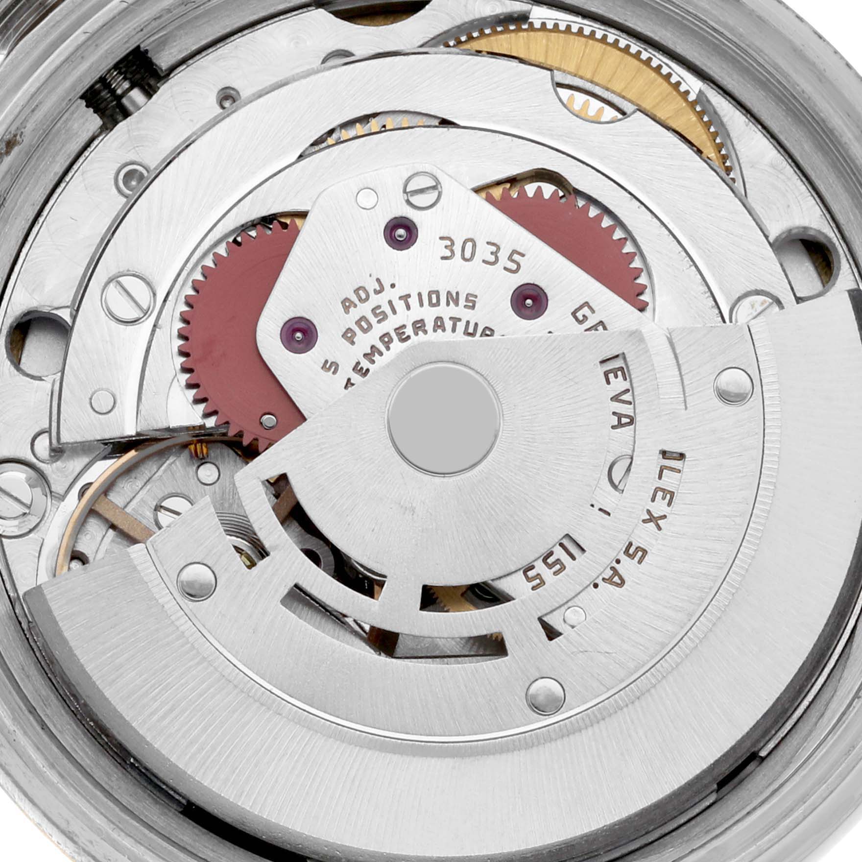 The image shows a detailed view of the movement inside a Rolex Datejust 16013 Men
s Steel and Gold (two tone) Champagne Dial 16013 Men
s Steel and Gold (two tone) Champagne Dial watch, highlighting the rotor and gears.