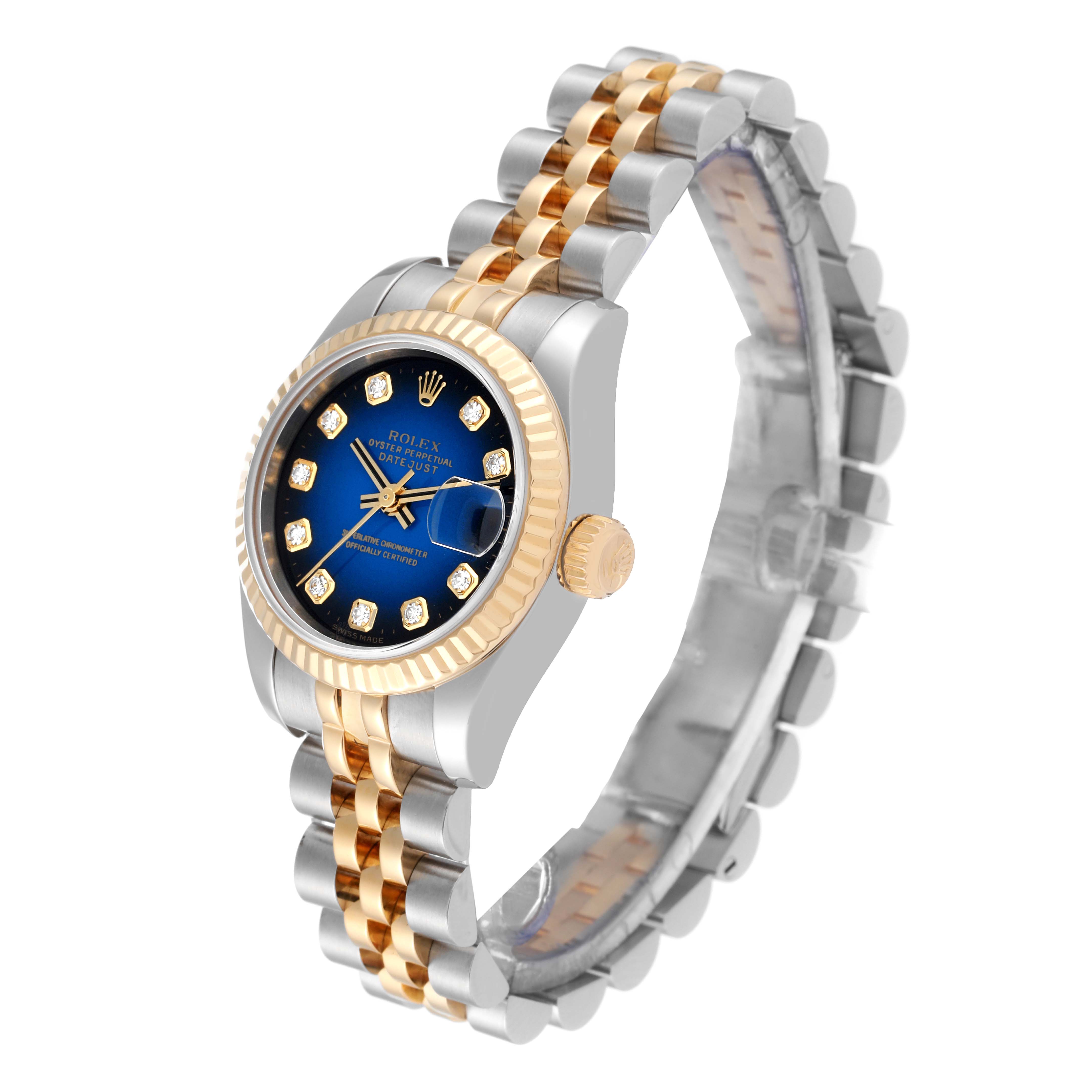 This Rolex Datejust 179173 Women's Steel and Gold (two tone) Blue Dial 179173 Women's Steel and Gold (two tone) Blue Dial watch is shown at an angled view, featuring the face, bezel, crown, and part of the two-tone bracelet.