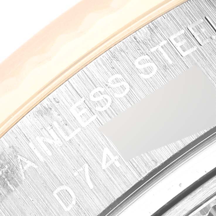 This close-up image shows the stainless steel case back with engravings of a Rolex Datejust 179173 Women's Steel and Gold (two tone) Blue Dial 179173 Women's Steel and Gold (two tone) Blue Dial watch.