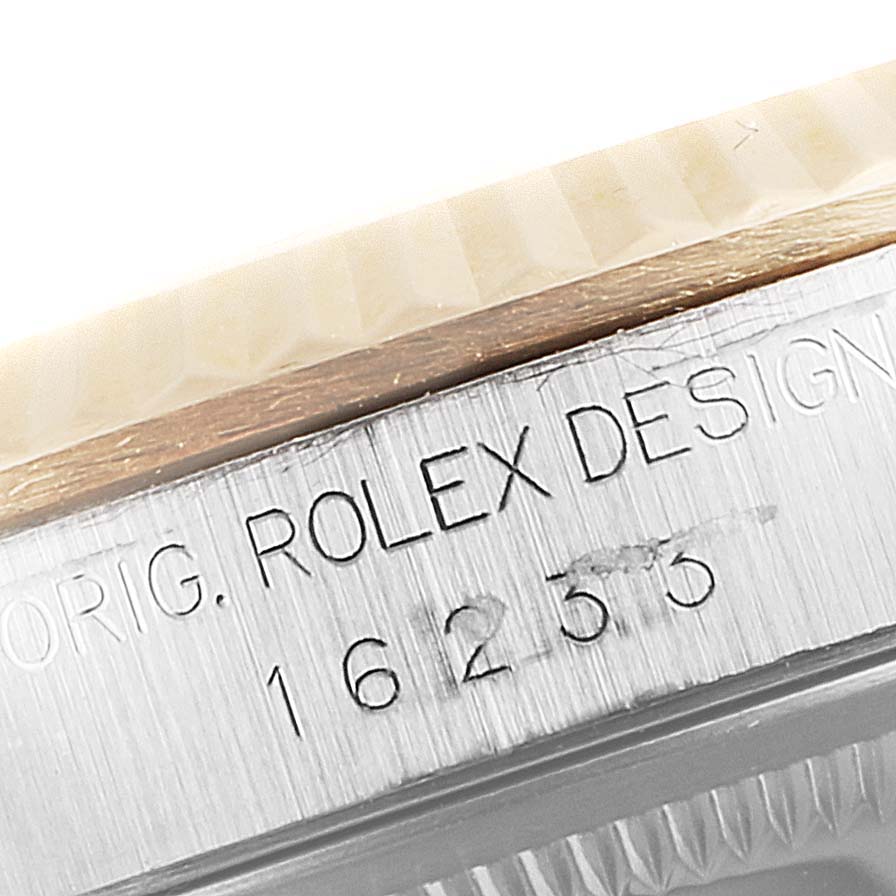 This image shows a close-up of the model number engravings on the side of a Rolex Datejust 16233 Men
s Steel and Gold (two tone) Grey Dial 16233 Men
s Steel and Gold (two tone) Grey Dial watch.