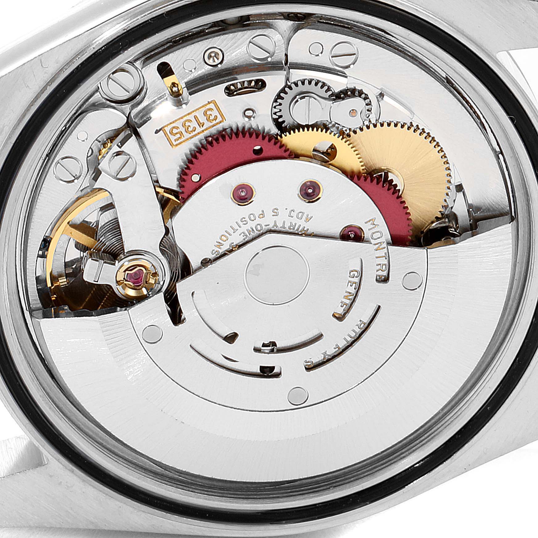 This is an image of the back view of a Rolex Datejust 16233 Men's Steel and Gold (two tone) White Dial 16233 Men's Steel and Gold (two tone) White Dial watch showing the intricate internal mechanical movement.