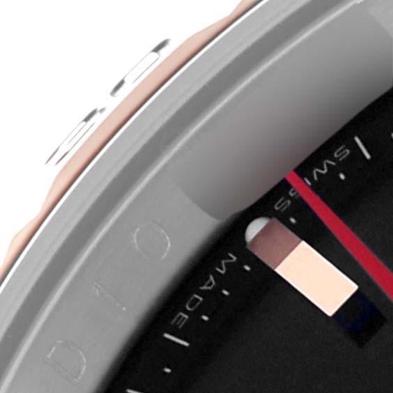 The image shows a partial close-up of the bezel and dial edge of the Rolex Turn-o-Graph 116261 Men's Steel and Gold (two tone) Black Dial 116261 Men's Steel and Gold (two tone) Black Dial watch.