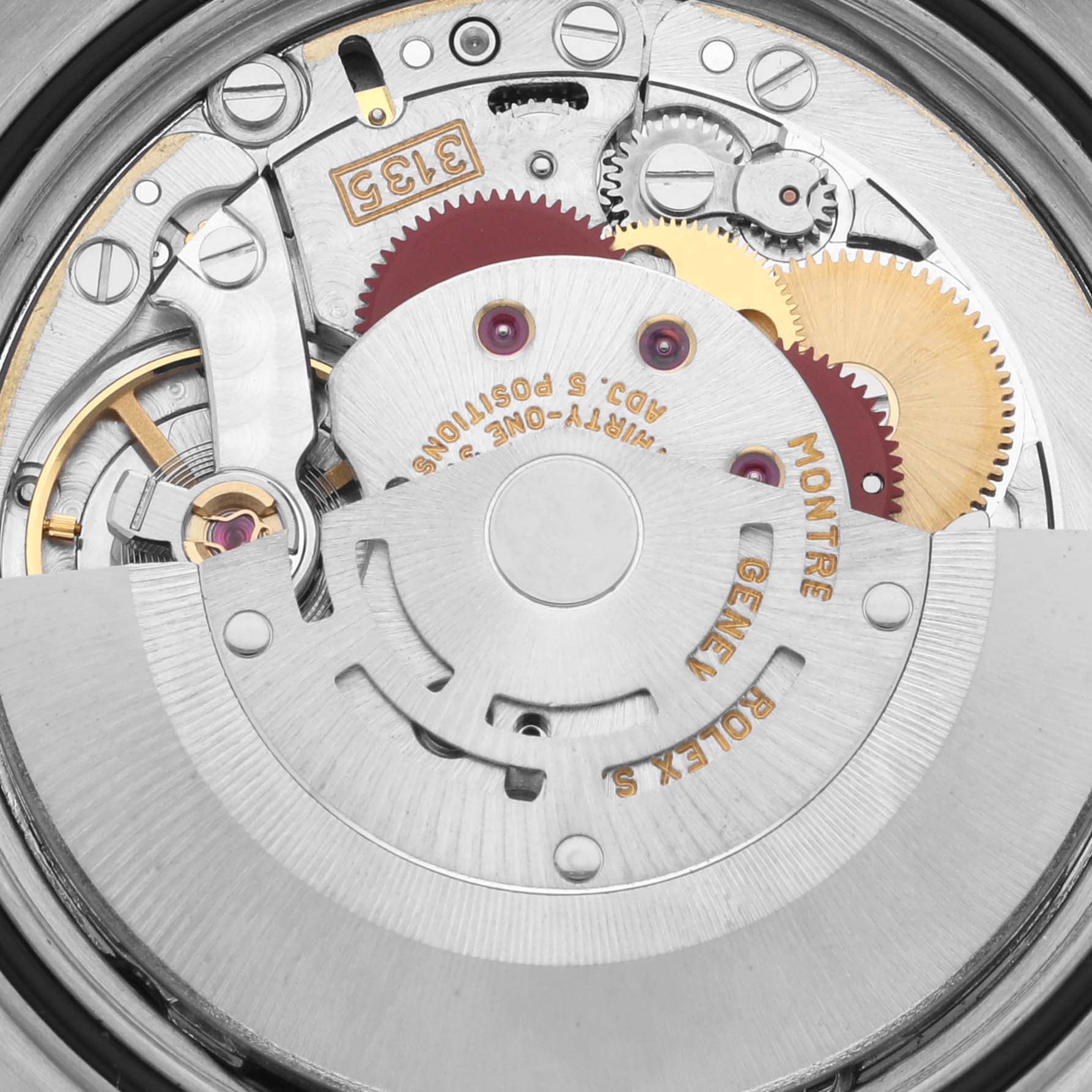 This image shows the movement of a Rolex Datejust 16233 Men's Steel and Gold (two tone) Blue Dial 16233 Men's Steel and Gold (two tone) Blue Dial, focusing on gears and intricate components from a close angle.