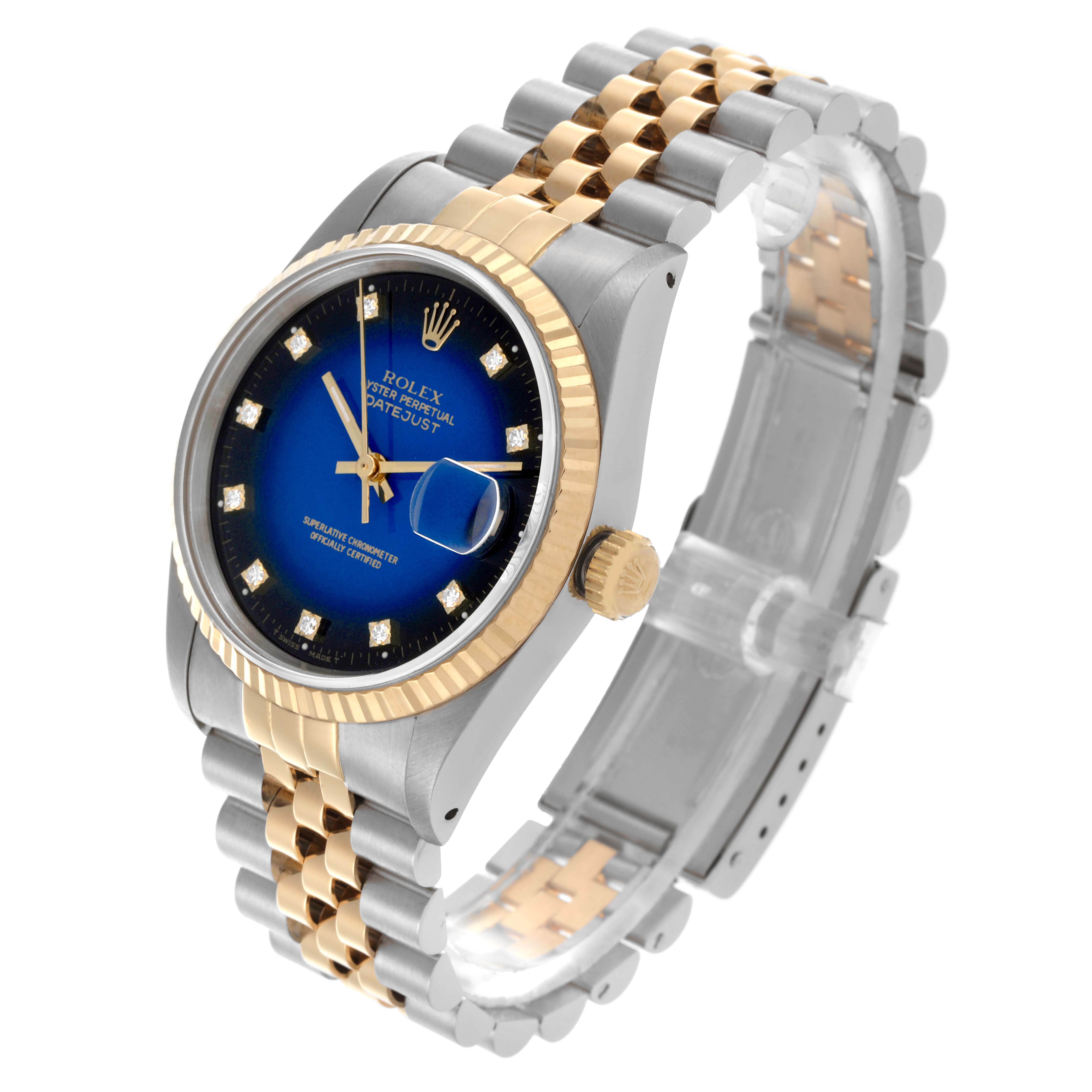The Rolex Datejust 16233 Men's Steel and Gold (two tone) Blue Dial 16233 Men's Steel and Gold (two tone) Blue Dial watch is shown at a three-quarter angle, highlighting the blue dial, gold fluted bezel, and Jubilee bracelet.