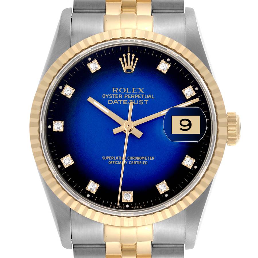 The image shows a front view of the Rolex Datejust watch, highlighting its blue dial, fluted bezel, and two-tone bracelet.