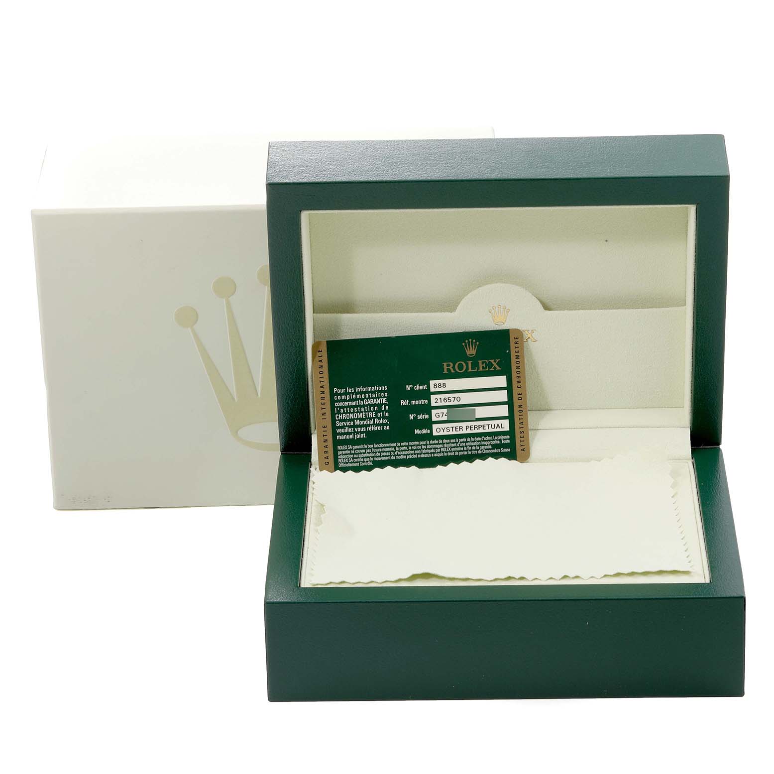 The image shows the packaging and authenticity card for a Rolex Explorer 216570 Men's Stainless Steel Black Dial 216570 Men's Stainless Steel Black Dial model, with an open green box and white cleaning cloth.