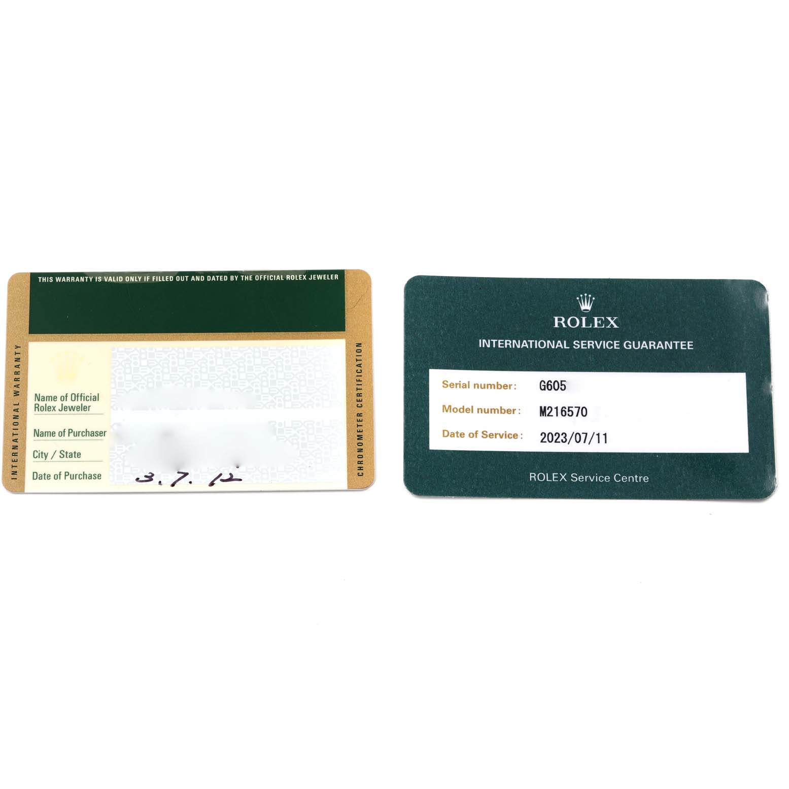 The image shows the warranty and international service guarantee cards for a Rolex Explorer 216570 Men's Stainless Steel White Dial 216570 Men's Stainless Steel White Dial model M216570.