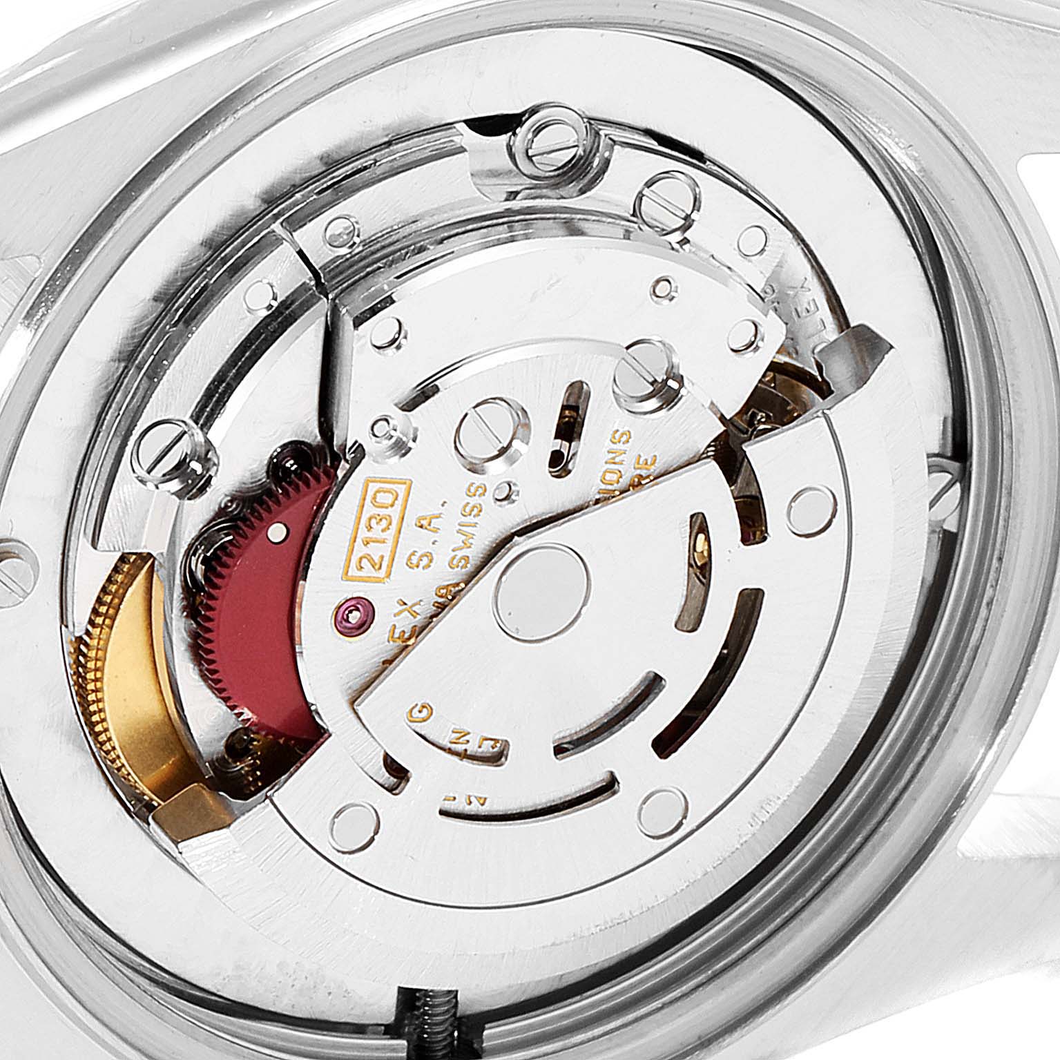 This image shows a close-up view of the movement mechanism of a Mid-Size Rolex watch.