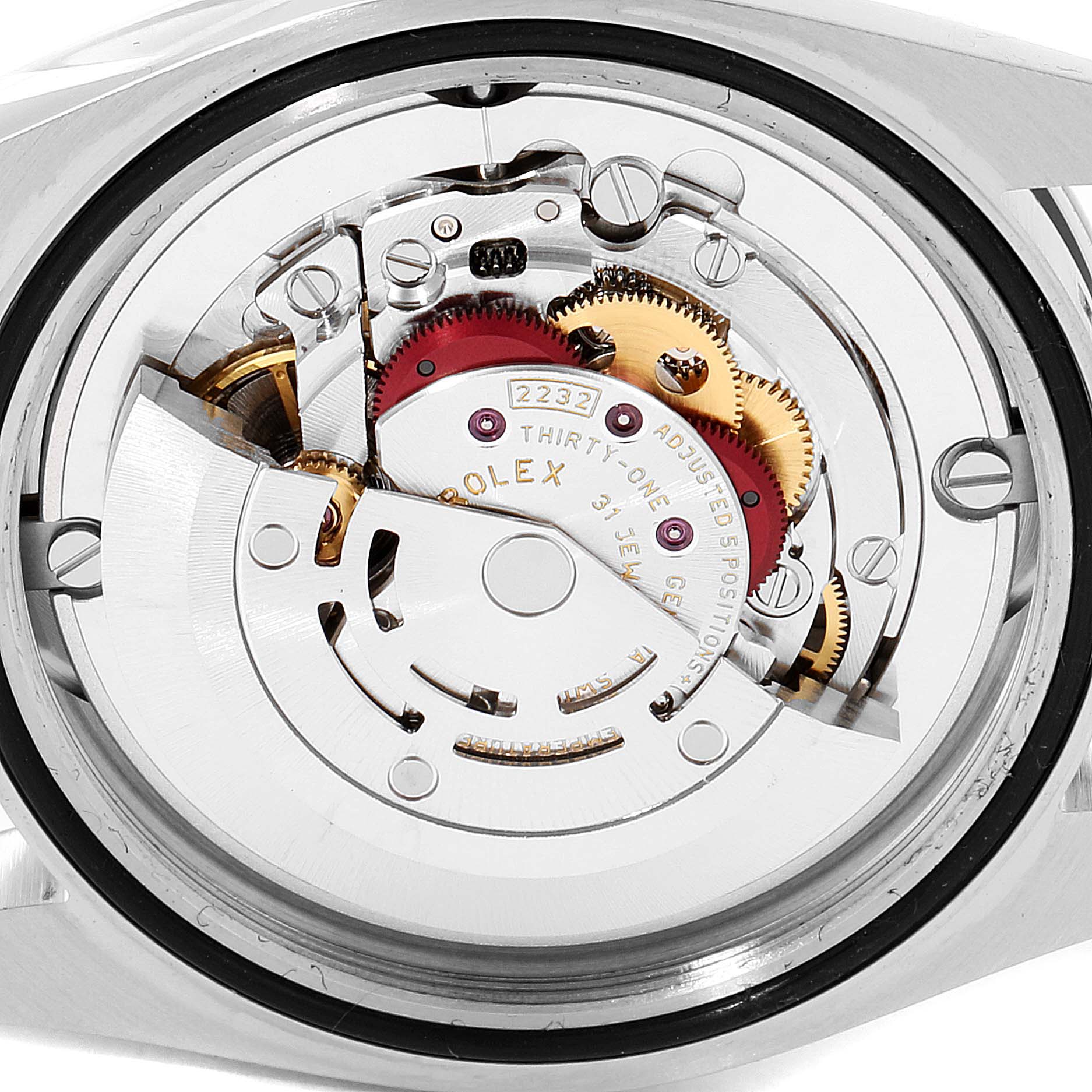 The image shows the internal mechanism of a Rolex Oyster Perpetual 124200 Men's Stainless Steel Blue Dial 124200 Men's Stainless Steel Blue Dial watch from a close-up, angled view.