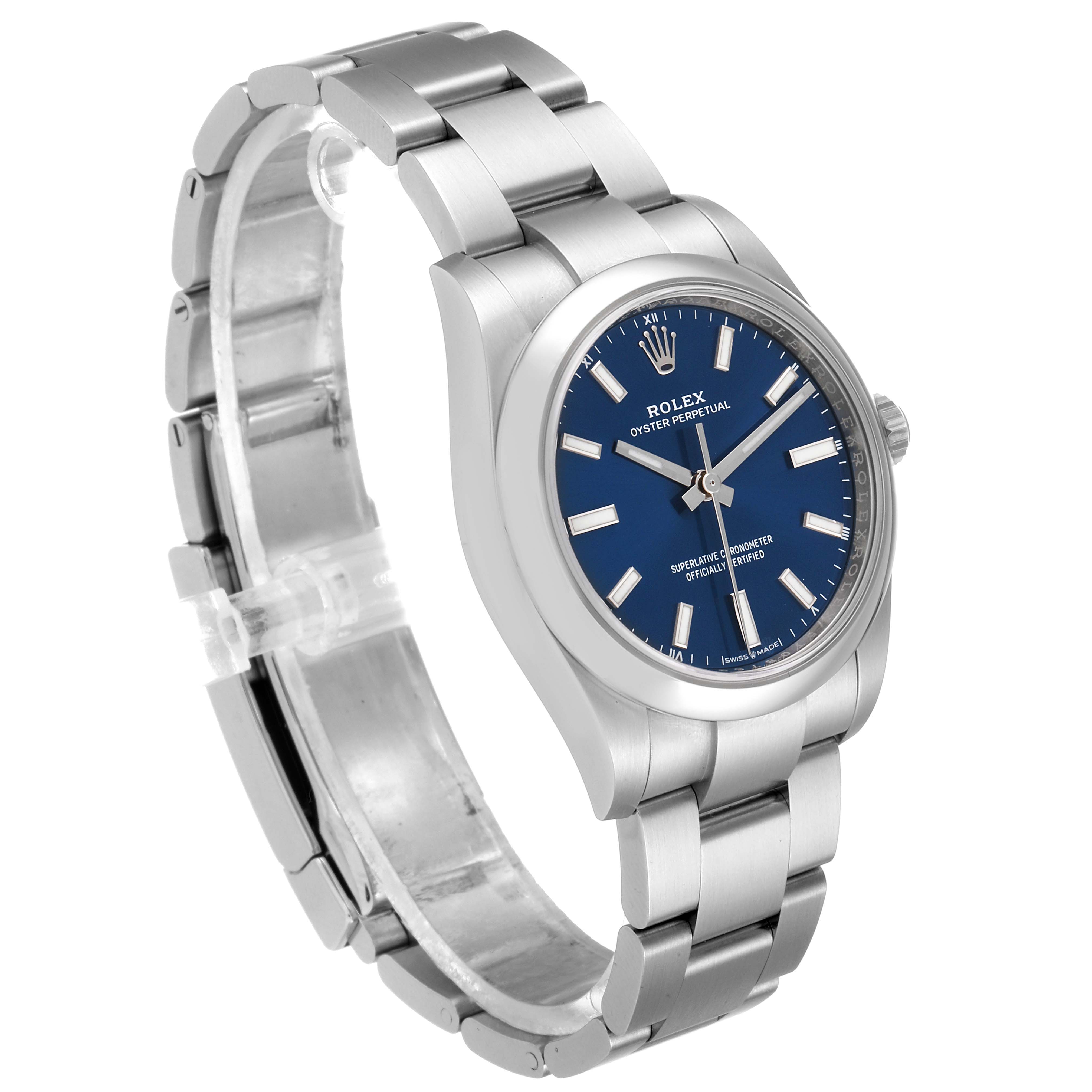 The image shows a Rolex Oyster Perpetual 124200 Men's Stainless Steel Blue Dial 124200 Men's Stainless Steel Blue Dial watch at an angled side view highlighting its blue dial, stainless steel bracelet, and case.