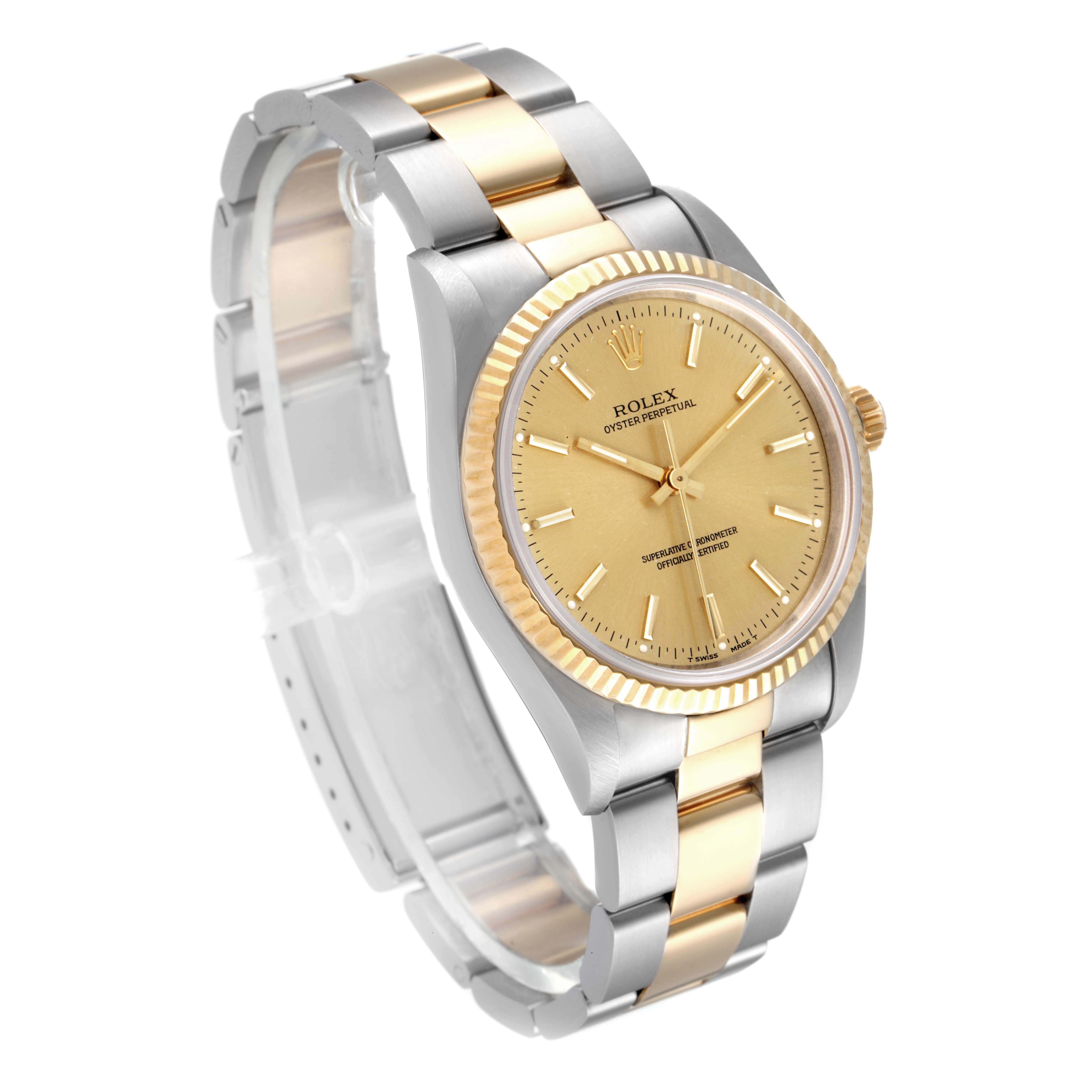 The image shows a side angle of the Rolex Oyster Perpetual 14233 Men
s Steel and Gold (two tone) Champagne Dial 14233 Men
s Steel and Gold (two tone) Champagne Dial watch, highlighting its dial, bracelet, and bezel.