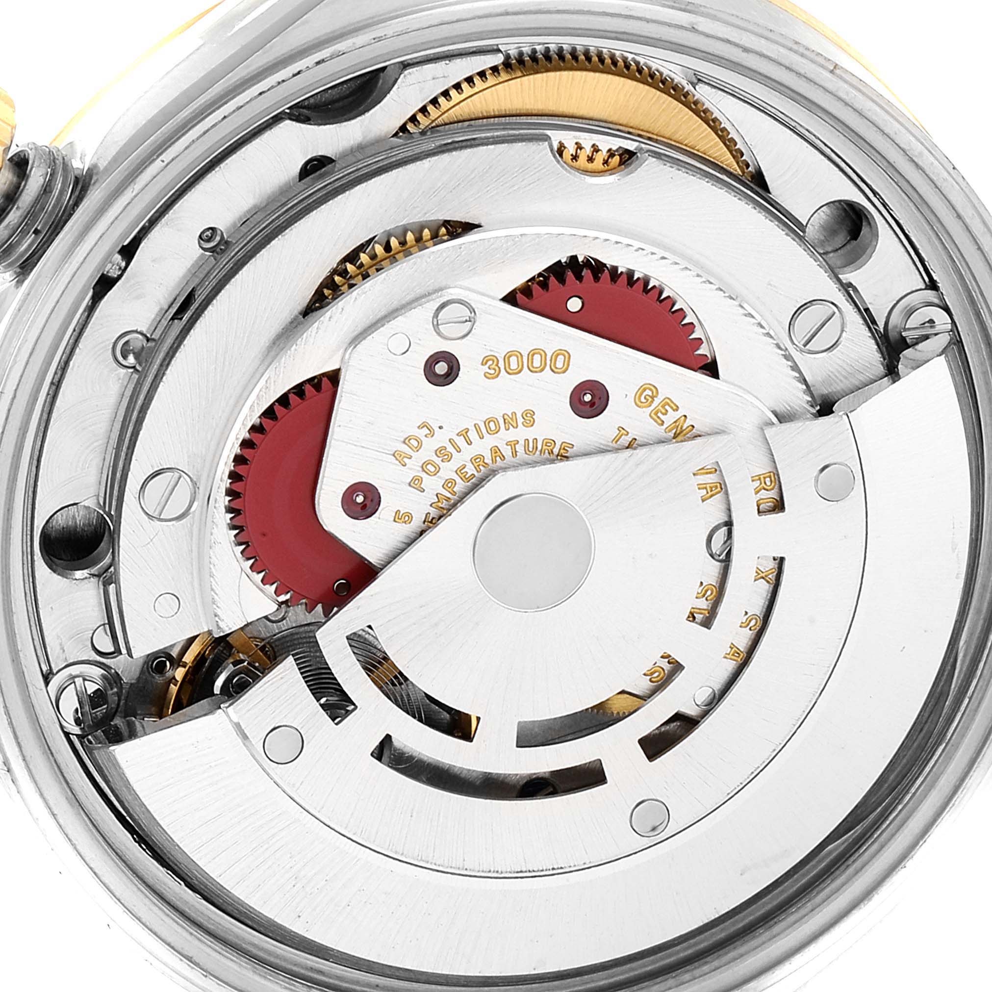 This image shows the movement mechanism of a Rolex Oyster Perpetual 14233 Men
s Steel and Gold (two tone) Champagne Dial 14233 Men
s Steel and Gold (two tone) Champagne Dial watch, viewed from the back.