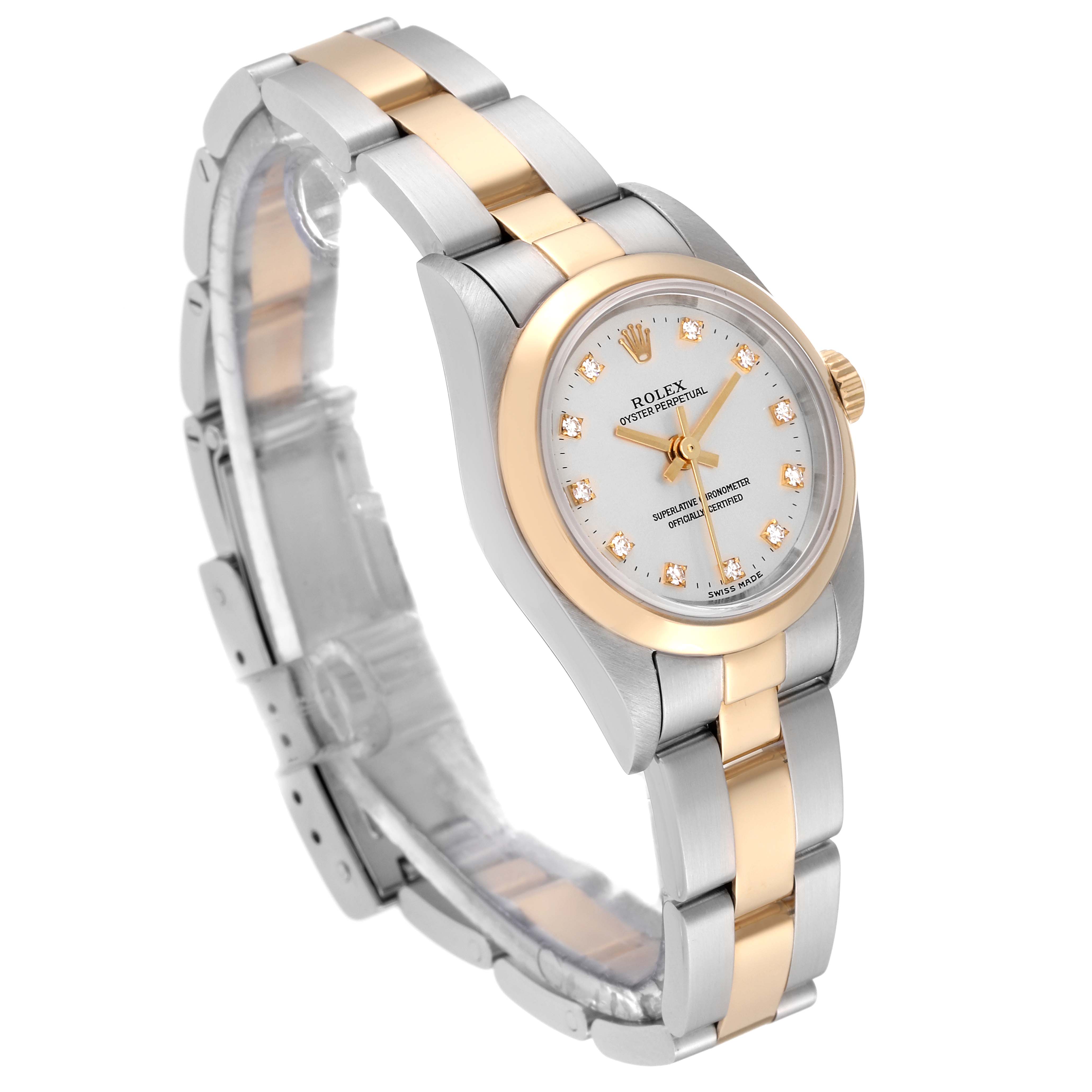 The Rolex Oyster Perpetual K745869 Women's Steel and Gold (two tone) Silver Dial K745869 Women's Steel and Gold (two tone) Silver Dial watch is shown at an angle that highlights its silver and gold bracelet, case, and dial with diamond hour markers.
