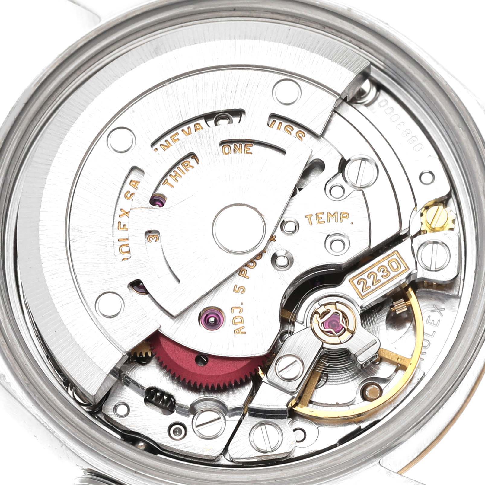 The image shows the internal mechanism of a Rolex Oyster Perpetual K745869 Women's Steel and Gold (two tone) Silver Dial K745869 Women's Steel and Gold (two tone) Silver Dial model watch viewed from the back.