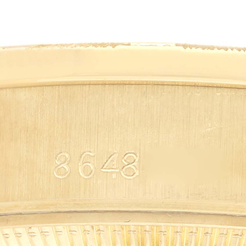 The image shows a close-up of the inner bezel or rehaut of a Rolex President 69288 Women's Yellow Gold Champagne Dial 69288 Women's Yellow Gold Champagne Dial watch, focusing on engraved numbers.
