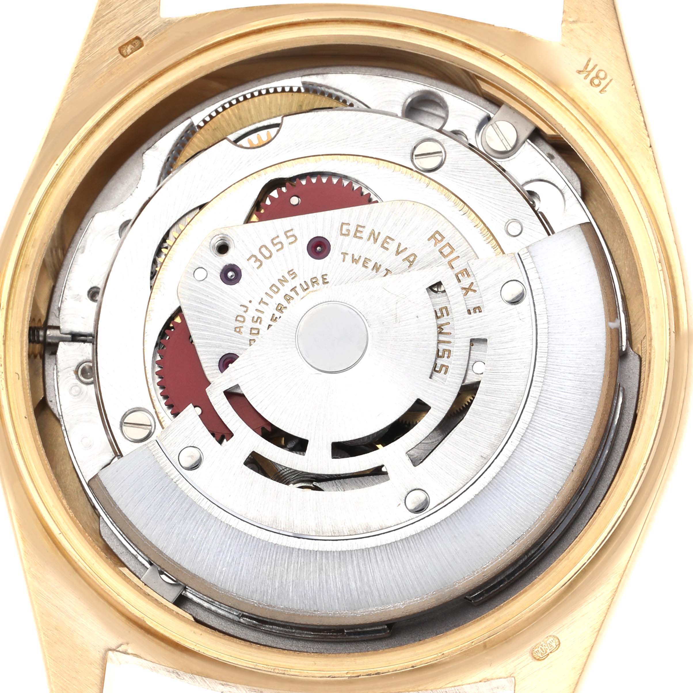 The image shows the movement from the back of a Rolex President 18078 Men's Yellow Gold Black Dial 18078 Men's Yellow Gold Black Dial watch, highlighting its automatic rotor and inner mechanics.