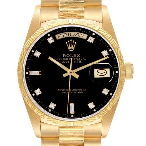 The Rolex President model is shown from a front angle, highlighting its black dial, gold case, and bracelet.