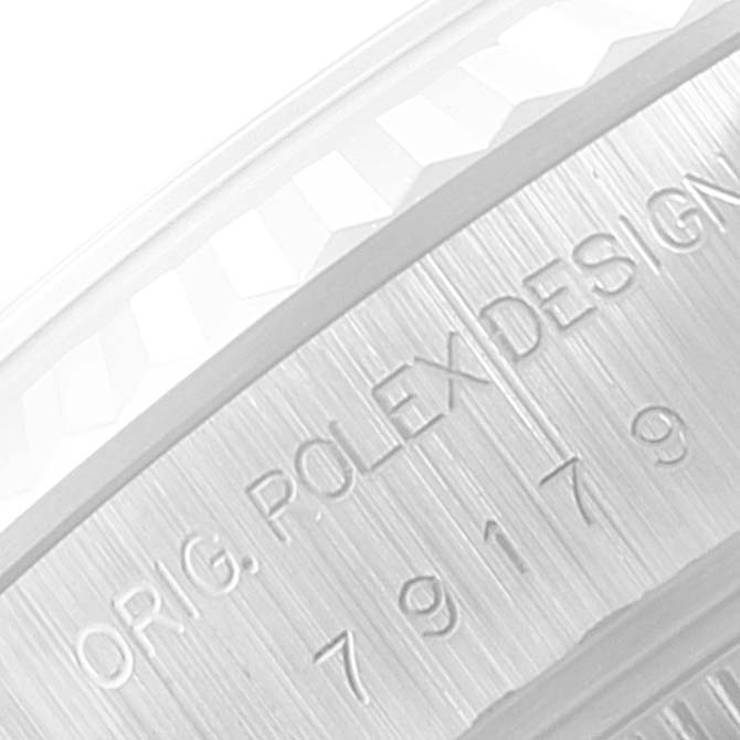 This close-up image shows the engraved serial number and design details on the side of a Rolex President 79179 Women's White Gold Silver Dial 79179 Women's White Gold Silver Dial watch.