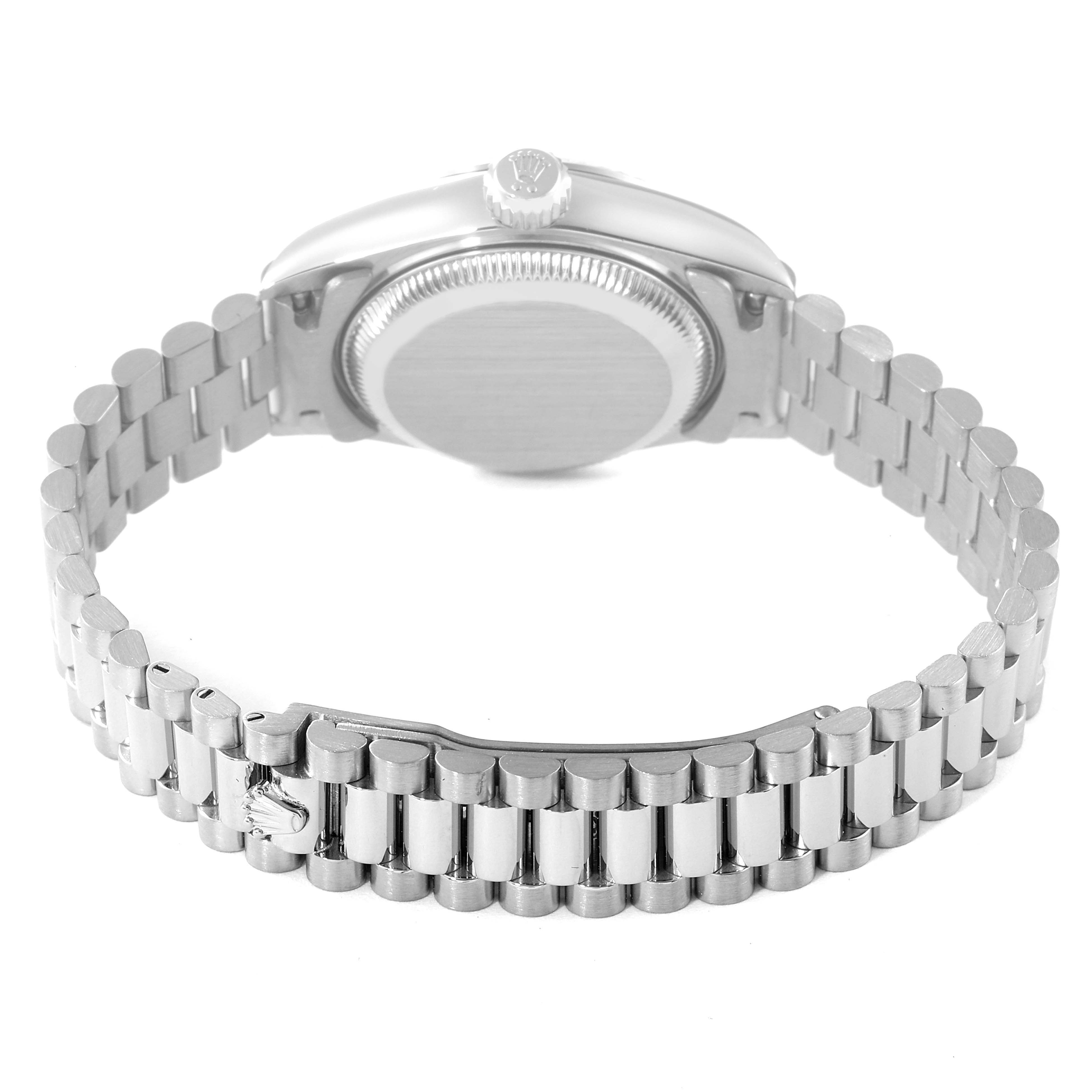 This image shows the back of a Rolex President 79179 Women's White Gold Silver Dial 79179 Women's White Gold Silver Dial model watch, focusing on the bracelet and caseback at an elevated angle.