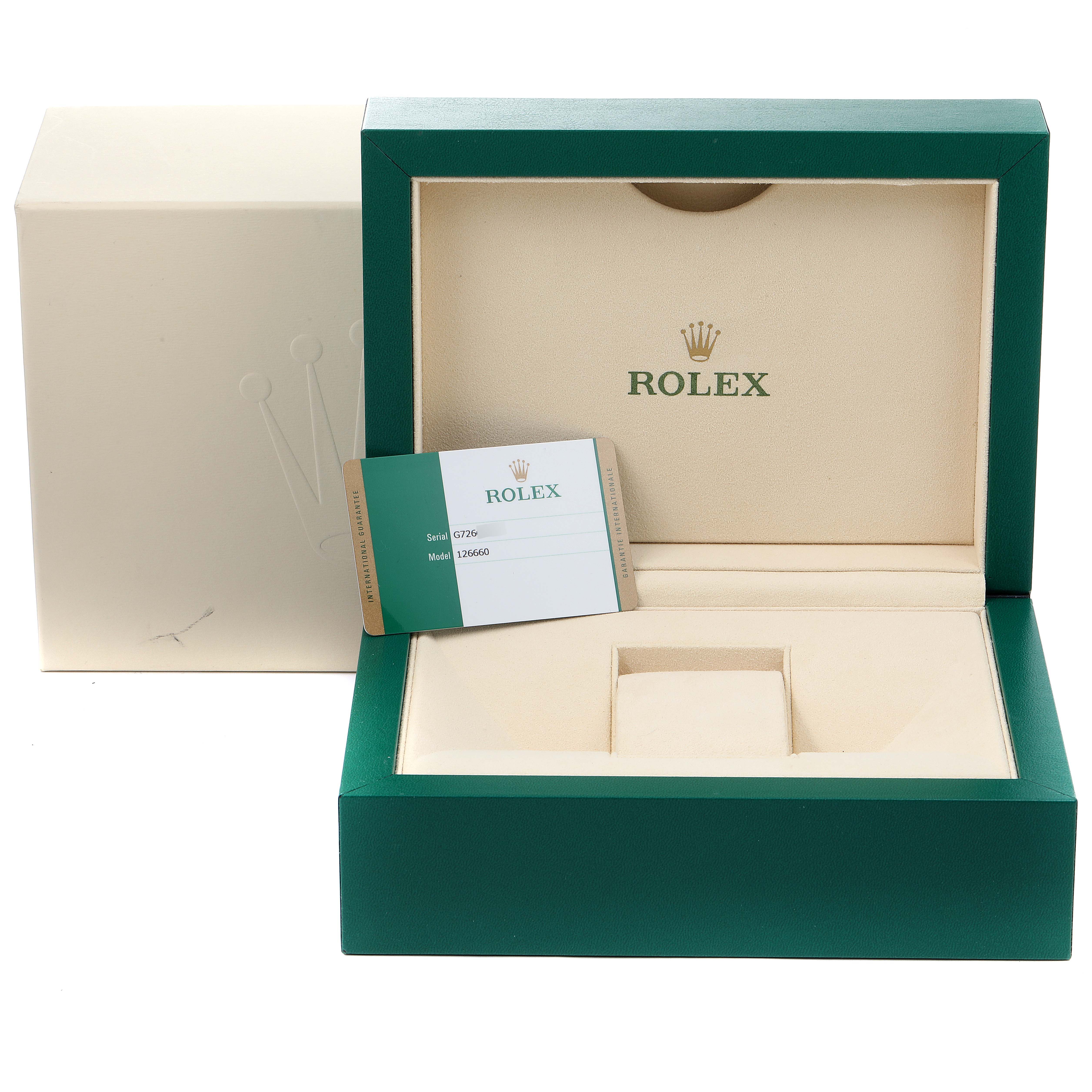 The image shows the open box and warranty card for the Rolex Sea-Dweller 126660 Men
s Stainless Steel Black Dial 126660 Men
s Stainless Steel Black Dial watch model.