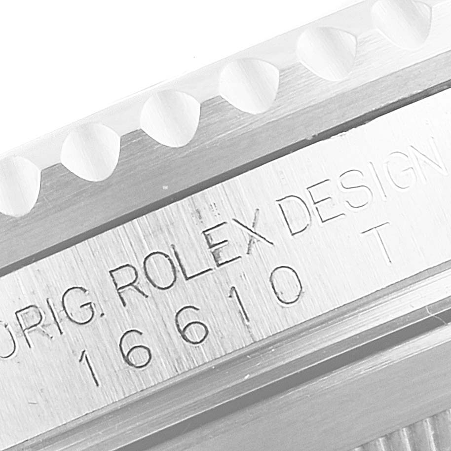 This close-up image shows the case side with engravings of the Rolex Submariner 16610 Men
s Stainless Steel Black Dial 16610 Men
s Stainless Steel Black Dial model 16610.