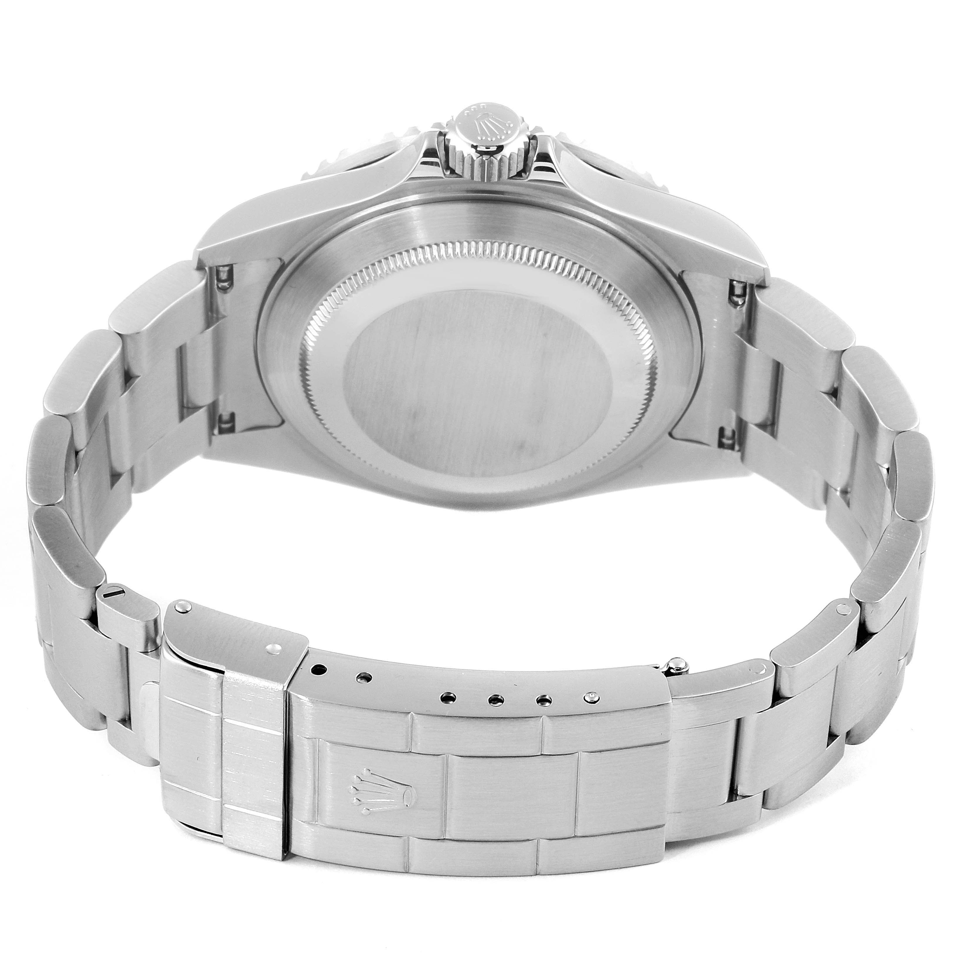 The image shows the back view of a Rolex Submariner 16610 Men
s Stainless Steel Black Dial 16610 Men
s Stainless Steel Black Dial watch, highlighting the case back, crown, and the bracelet with clasp.