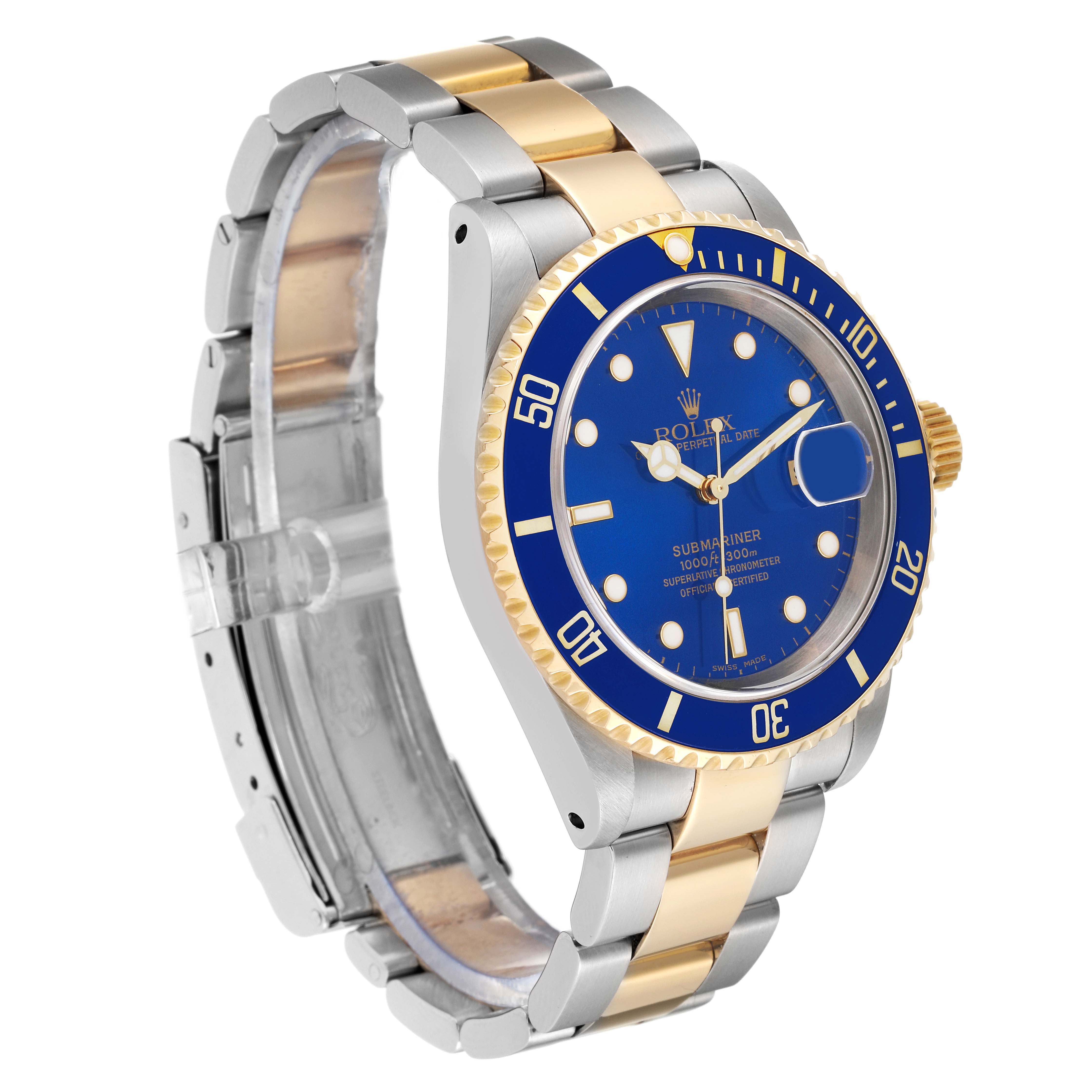 The image shows a Rolex Submariner 16613 Men's Steel and Gold (two tone) Blue Dial 16613 Men's Steel and Gold (two tone) Blue Dial watch at a three-quarter angle, highlighting its blue dial, bezel, and two-tone bracelet.