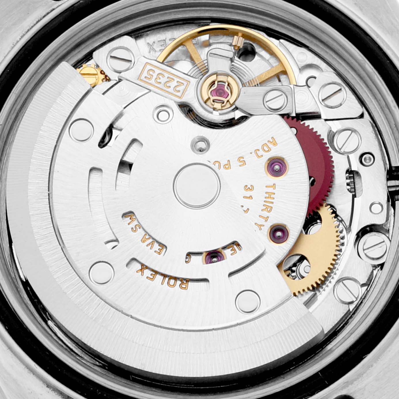 The image shows a close-up of the internal mechanism of a Rolex Yacht-Master 169623 Women
s Steel and Gold (two tone) Silver Dial 169623 Women
s Steel and Gold (two tone) Silver Dial watch, highlighting the intricate gears and rotor.