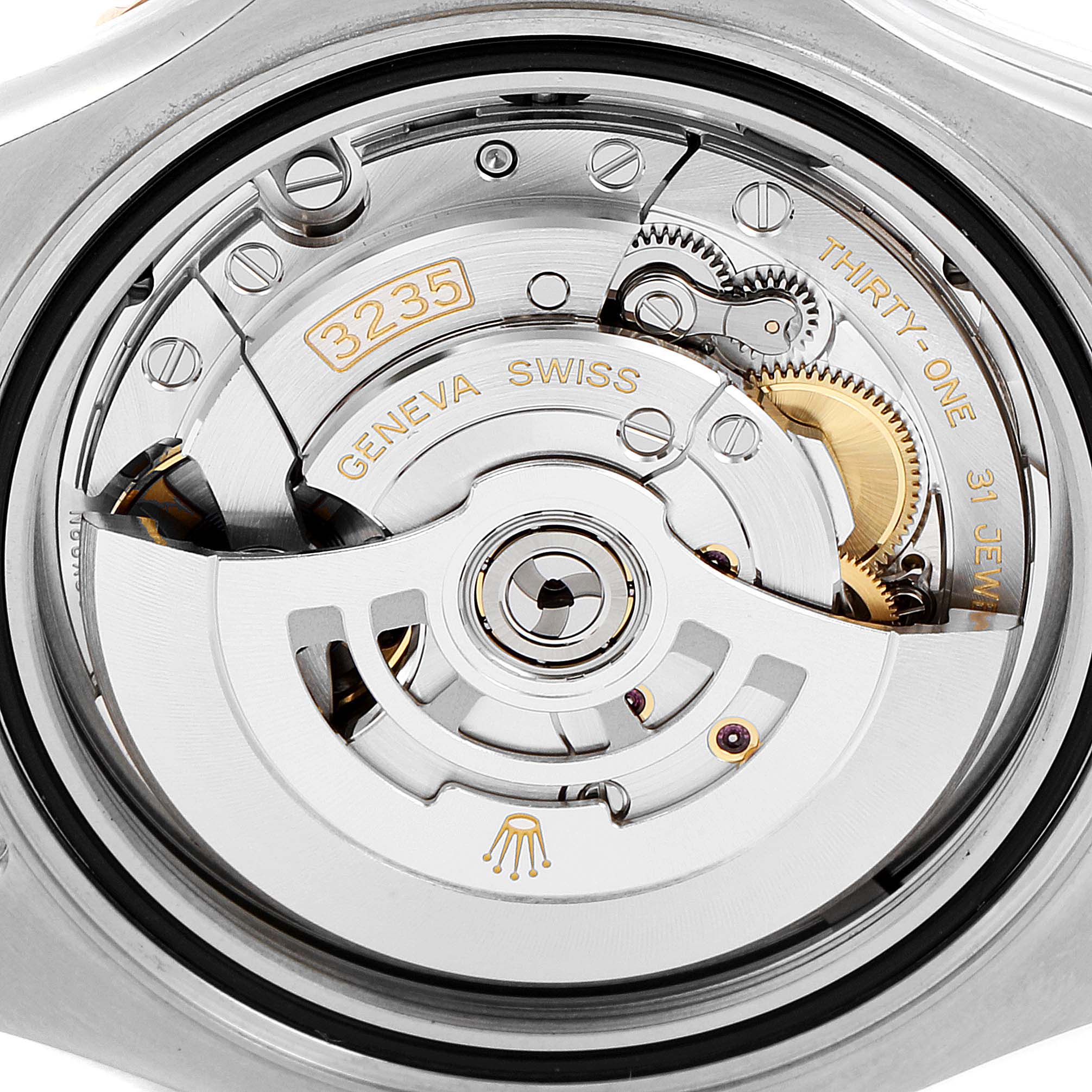 This image shows a close-up view of the Rolex Yacht-Master 126621 Men
s Steel and Gold (two tone) Black Dial 126621 Men
s Steel and Gold (two tone) Black Dial movement from the back, highlighting the intricate gears and balances.