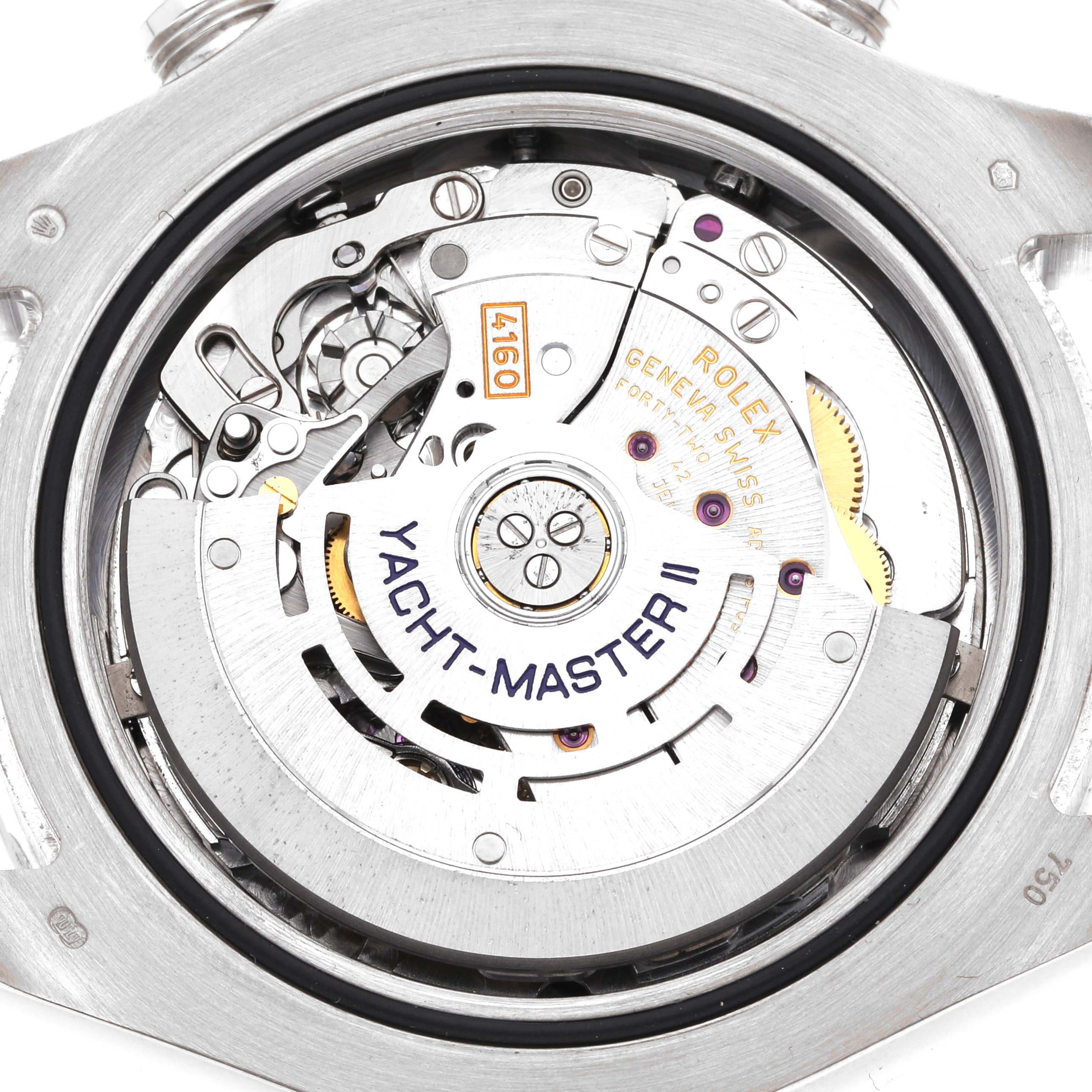 The image shows the back of a Rolex Yacht-Master 116689 Men's White Gold White Dial 116689 Men's White Gold White Dial watch, highlighting the movement and intricate internal mechanisms.