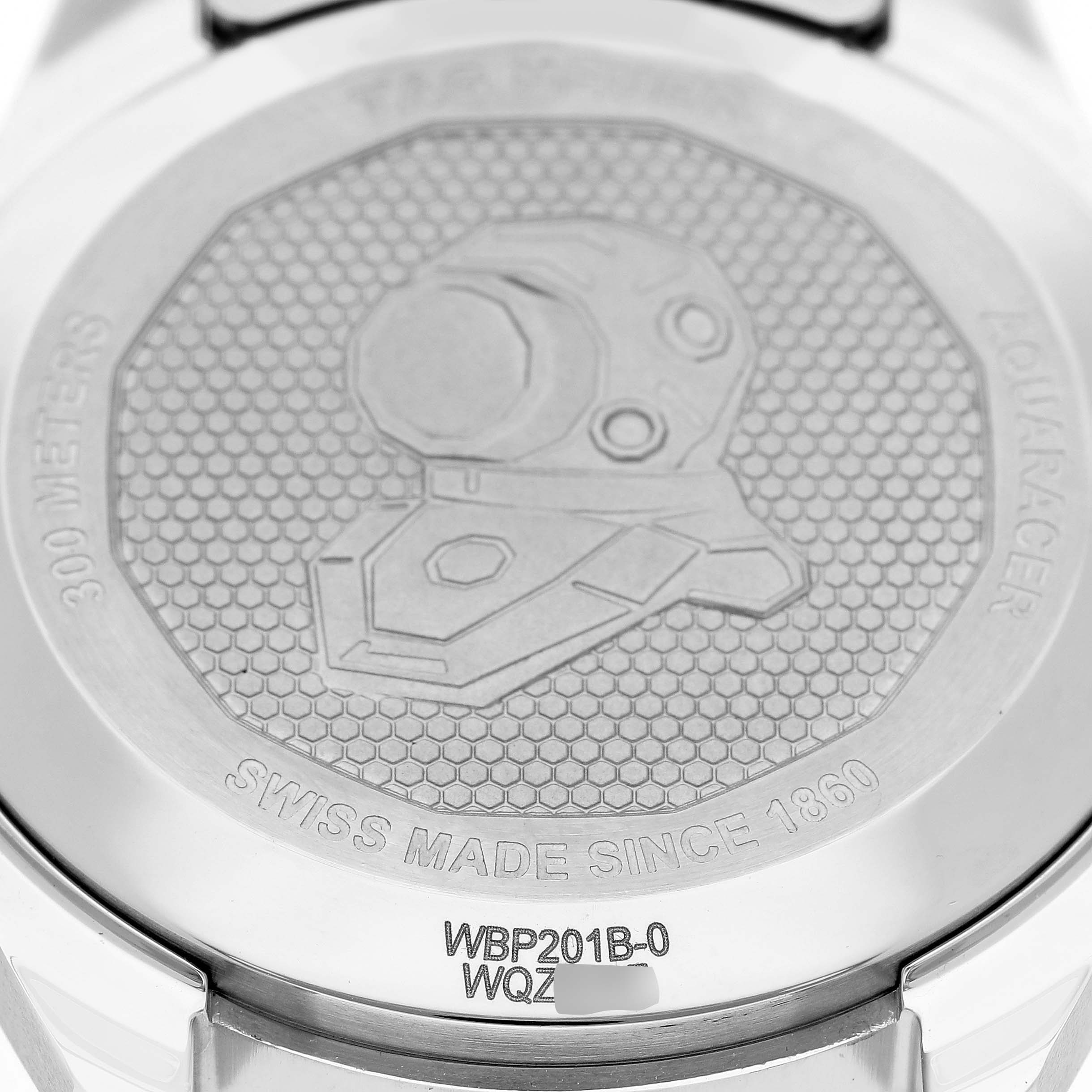 The image shows the case back of a Tag Heuer Aquaracer WBP201B.BA0632 Men's Stainless Steel Blue Dial WBP201B.BA0632 Men's Stainless Steel Blue Dial watch with engravings and model information.