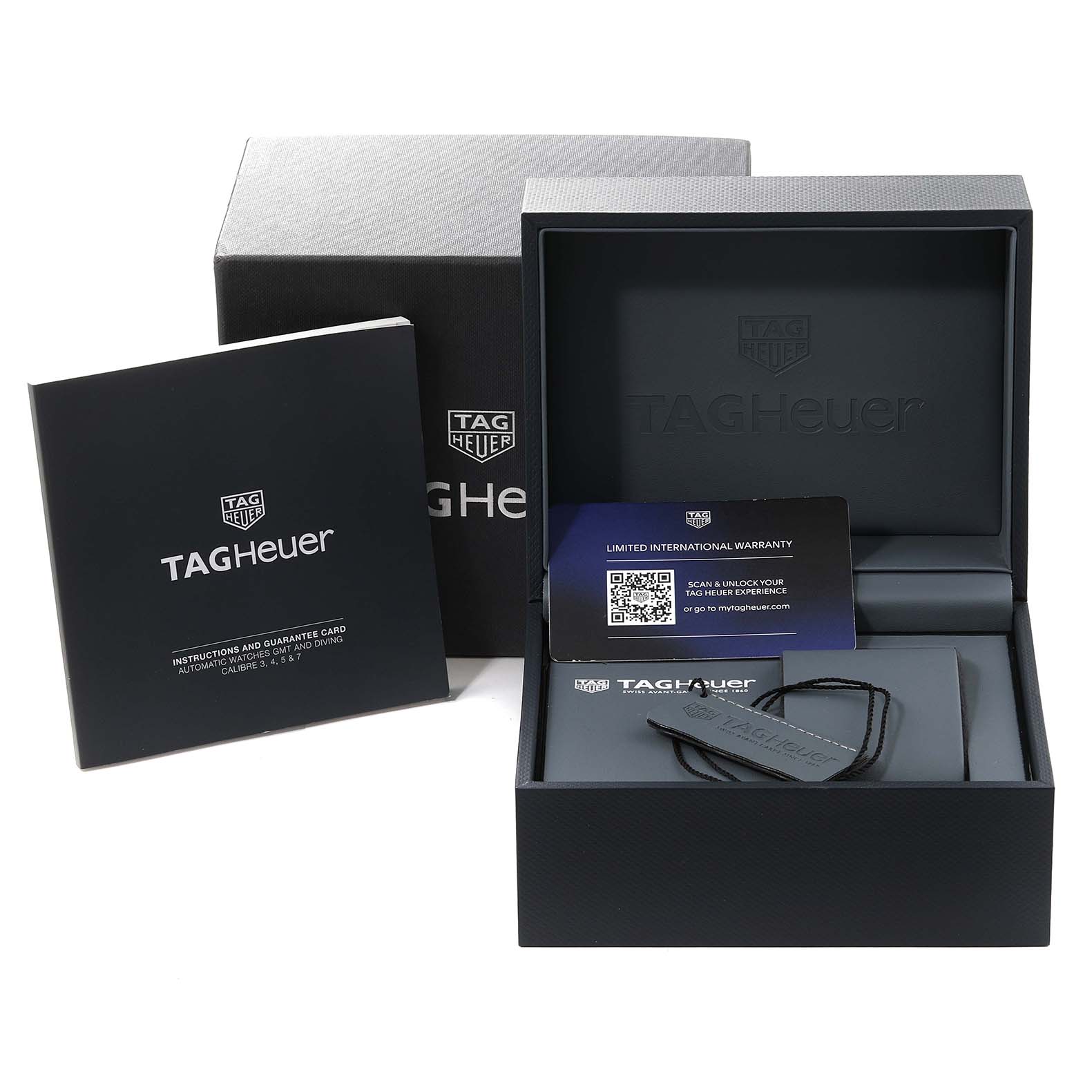 The image showcases the Tag Heuer Aquaracer WBP201B.BA0632 Men's Stainless Steel Blue Dial WBP201B.BA0632 Men's Stainless Steel Blue Dial box, warranty card, and instruction manual from a frontal angle.