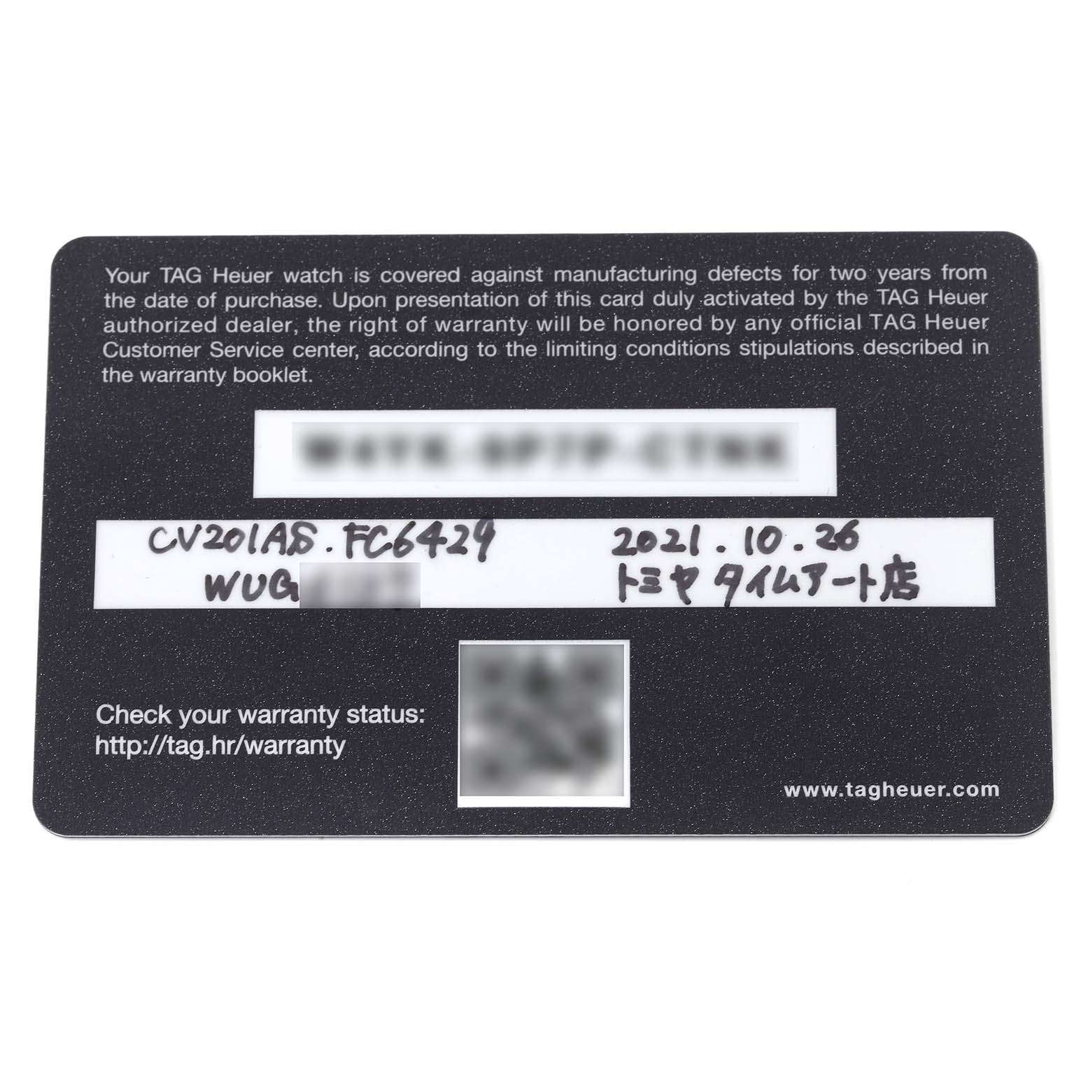 The image shows a warranty card for the Tag Heuer Carrera CV201AS.FC6429 Men
s Stainless Steel Black Dial CV201AS.FC6429 Men
s Stainless Steel Black Dial model watch, viewed from above.