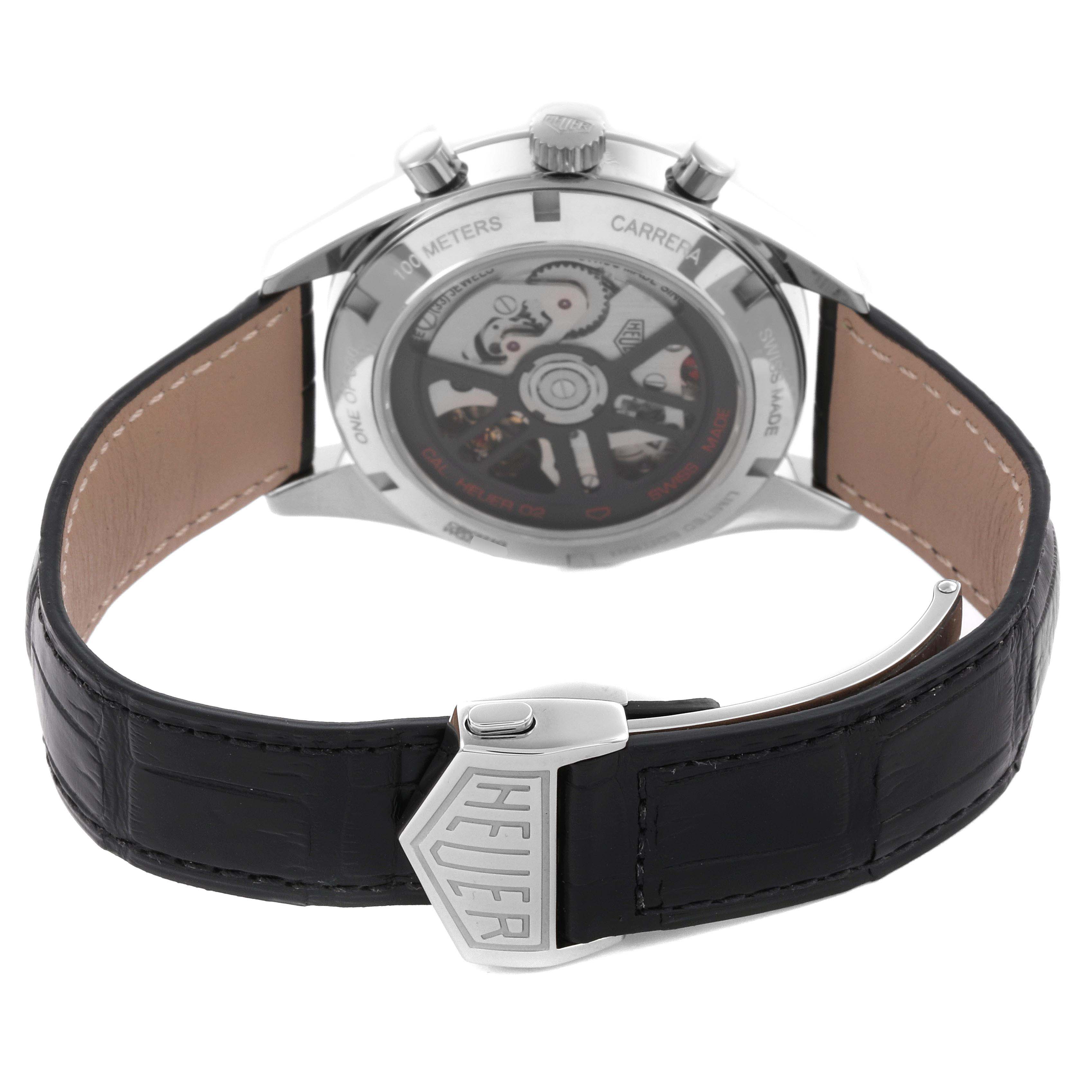 The image shows the back view of the Tag Heuer Carrera CBK221G.FC6479 Men's Stainless Steel Red Dial CBK221G.FC6479 Men's Stainless Steel Red Dial watch, highlighting the transparent case back and clasp.